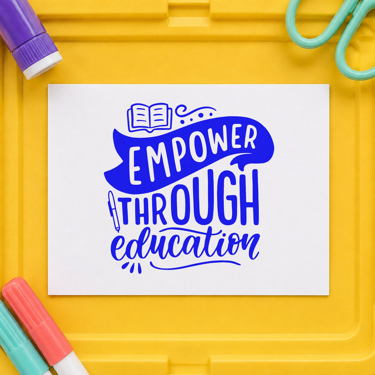 Empower Through Education craft stamp in blue ink on cardstock, an easy option for donor sash panels.