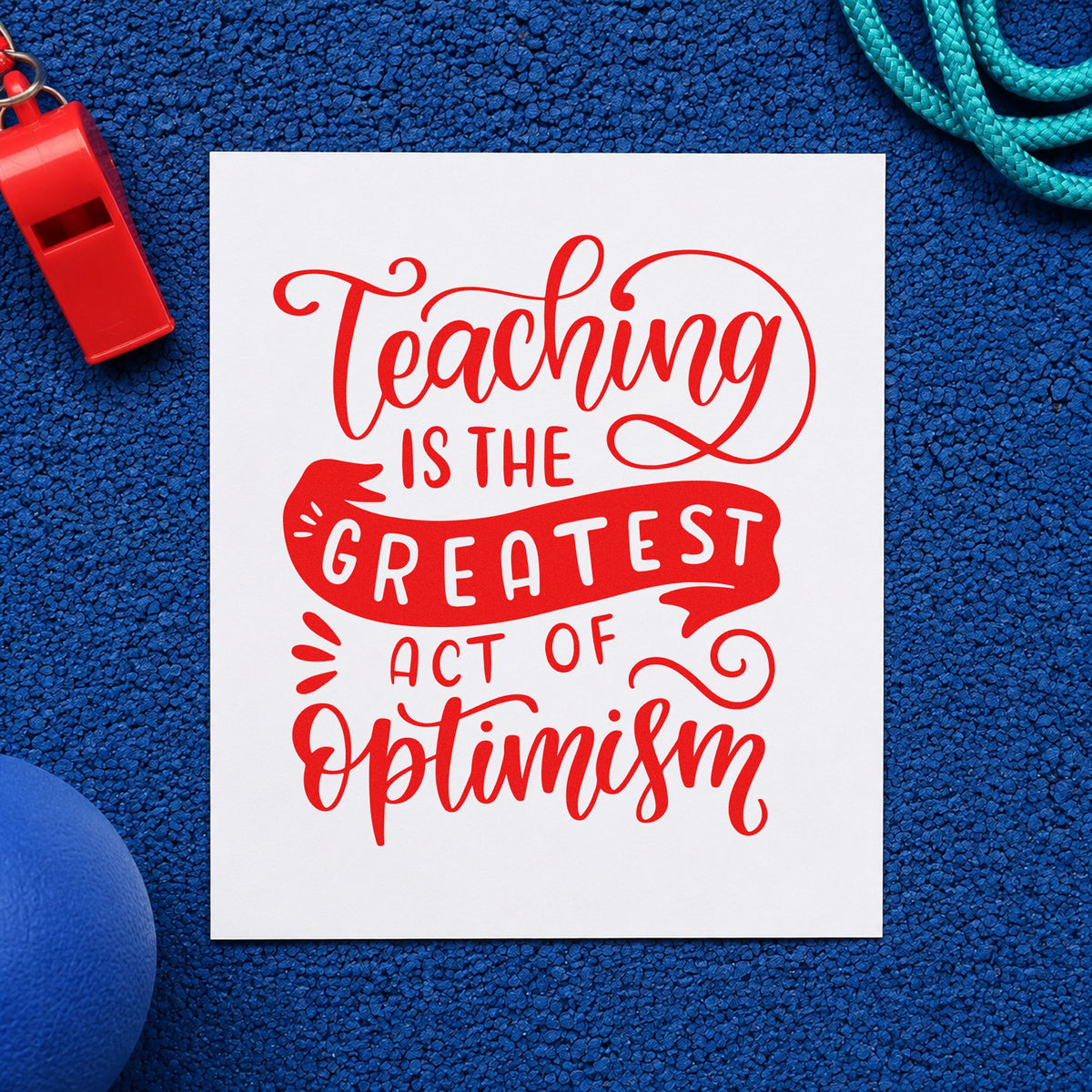 Teaching Greatest Act Of Optimism rubber stamp shown in red ink, stamped for projects such as term start notes.