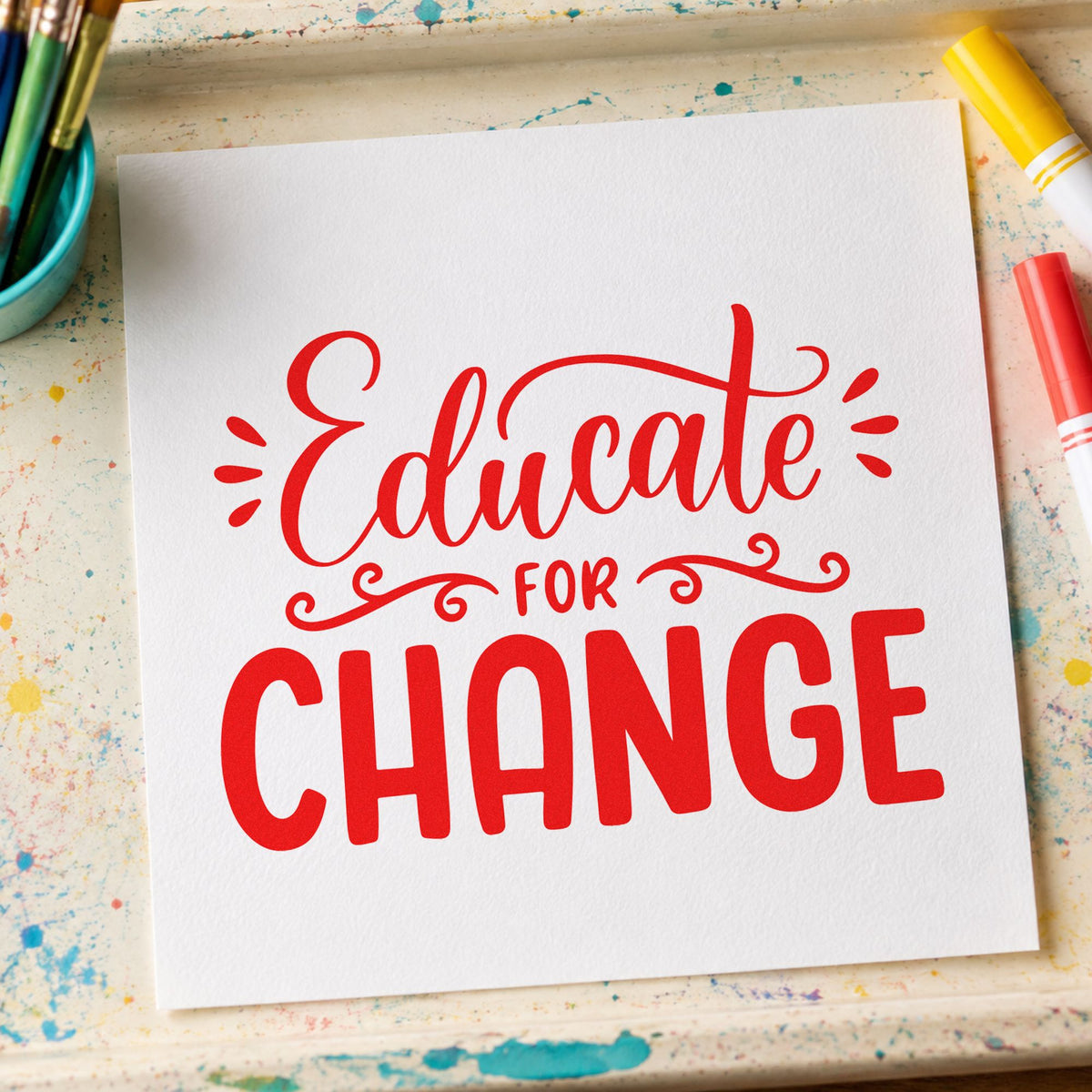 Educate For Change rubber stamp shown in red ink, stamped for projects such as completion day notes.
