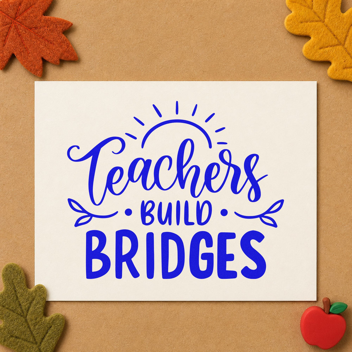 Teachers Build Bridges craft stamp in blue ink on cardstock, an easy option for welcome mat panels.