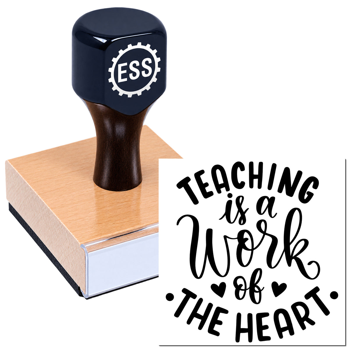 Dark navy ESS rubber stamp on a wooden block beside a black "Teaching is a Work of the Heart" seal design.