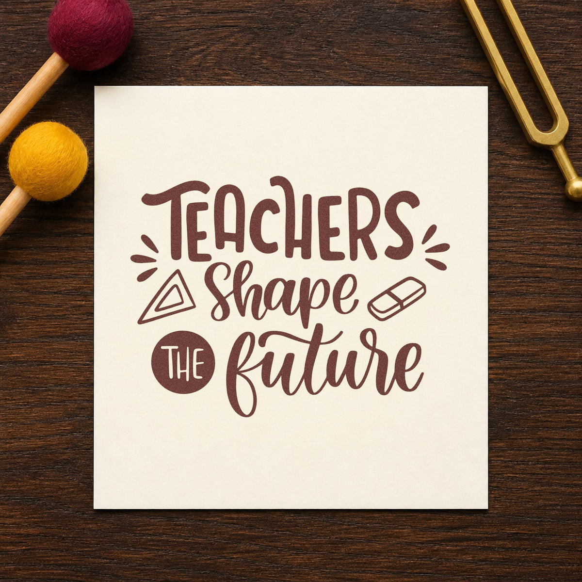 Teachers Shape The Future rubber stamp printed in brown ink, ready for tool rack labels and similar paper crafts.