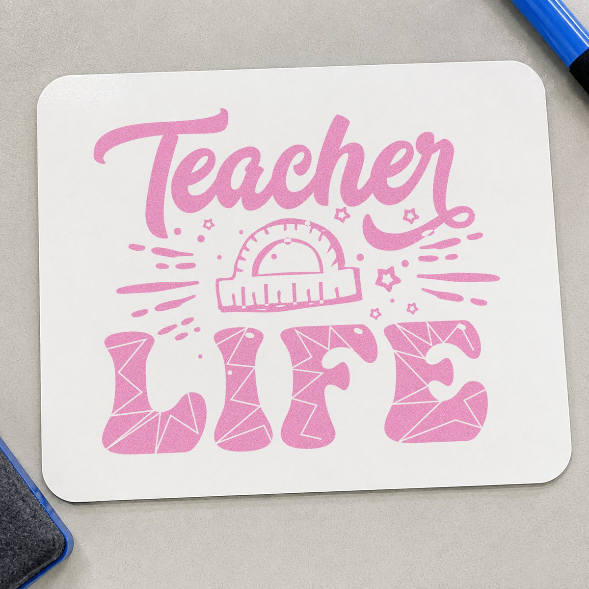 Teacher Life Geometry Pattern craft stamp in purple ink on cardstock, an easy option for geometry set tags.