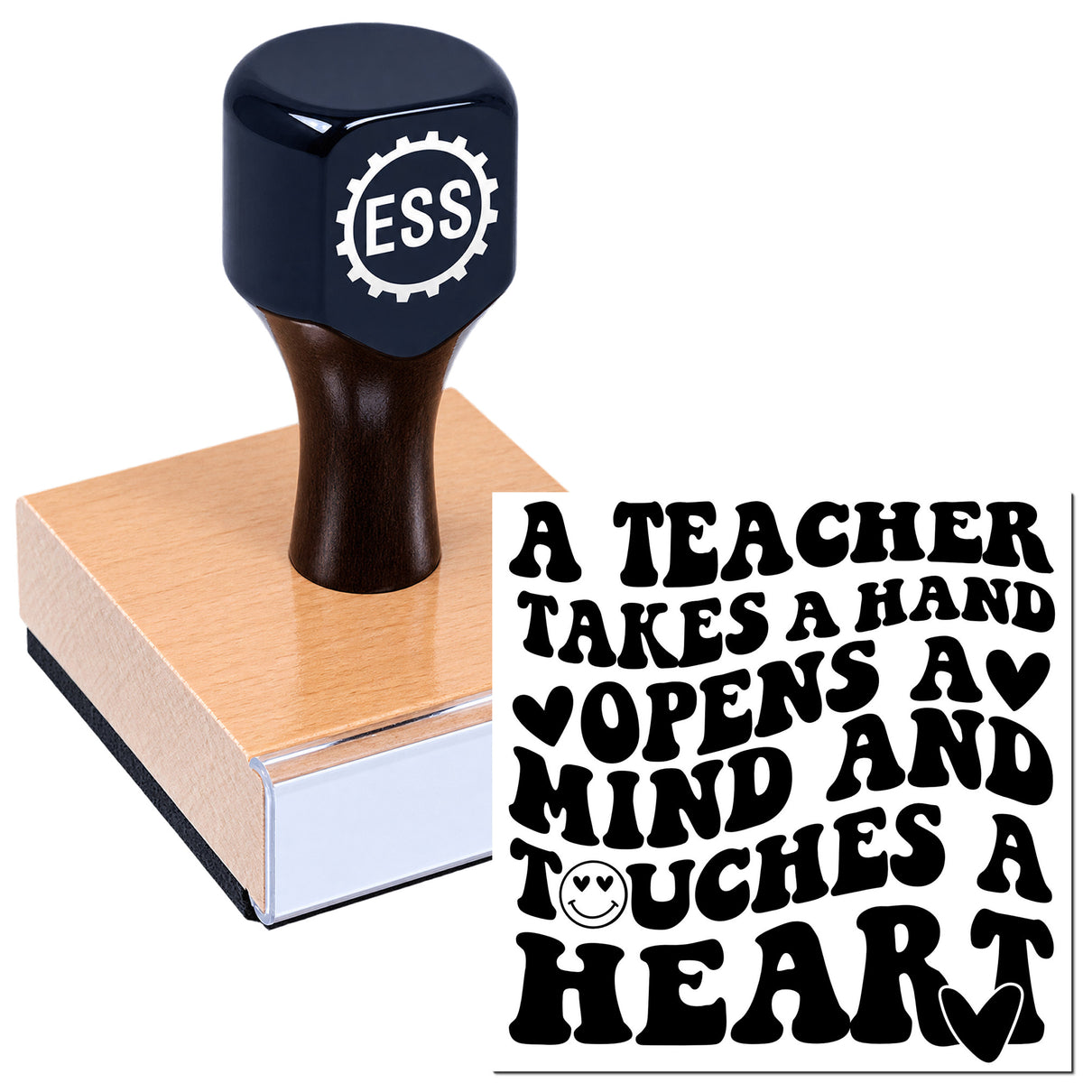 Black teacher stamp on a wood block beside a seal reading "A TEACHER TAKES A HAND..." in bold black letters with hearts.