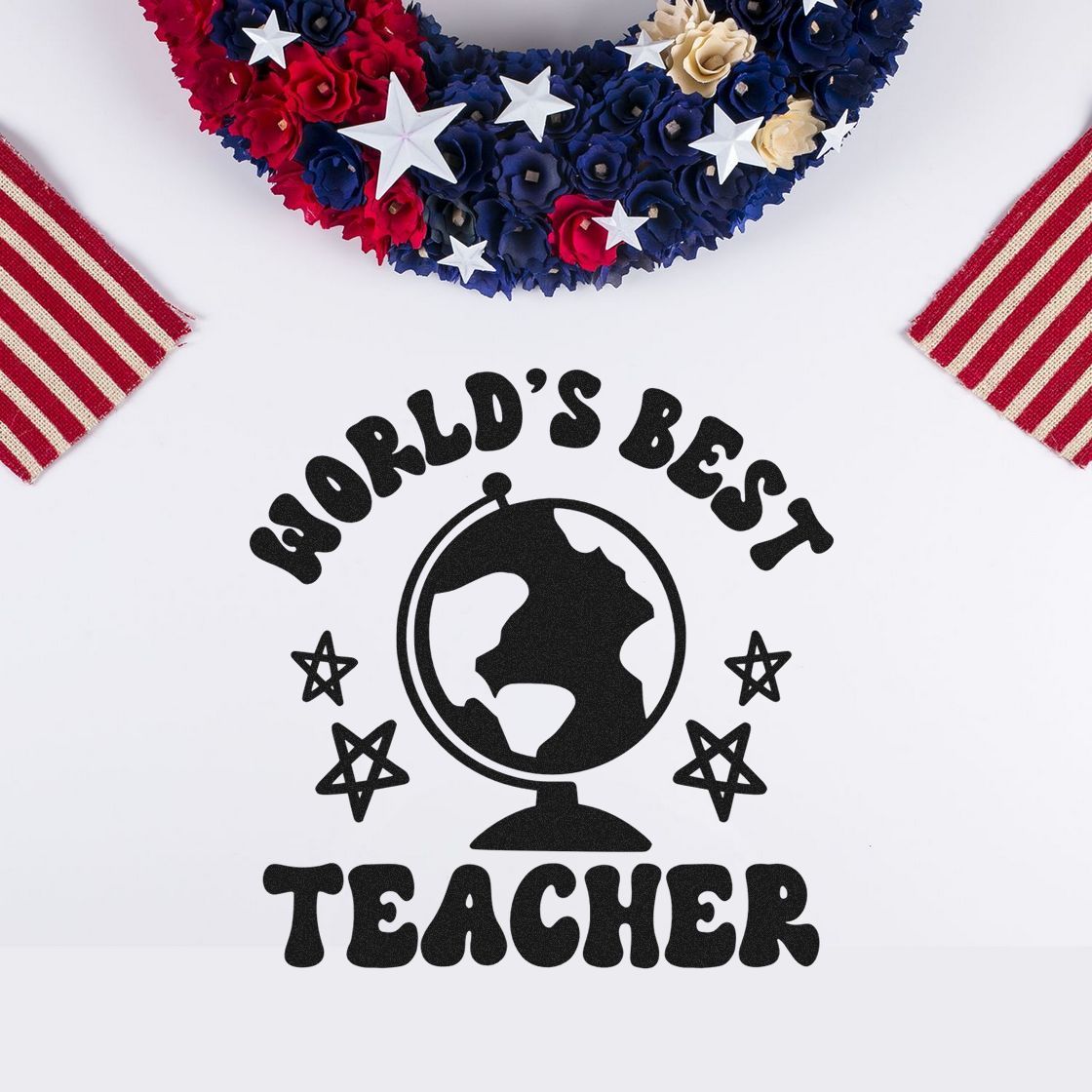 Black World's Best Teacher globe stamp with stars, framed by red, navy and cream patriotic seal accents.