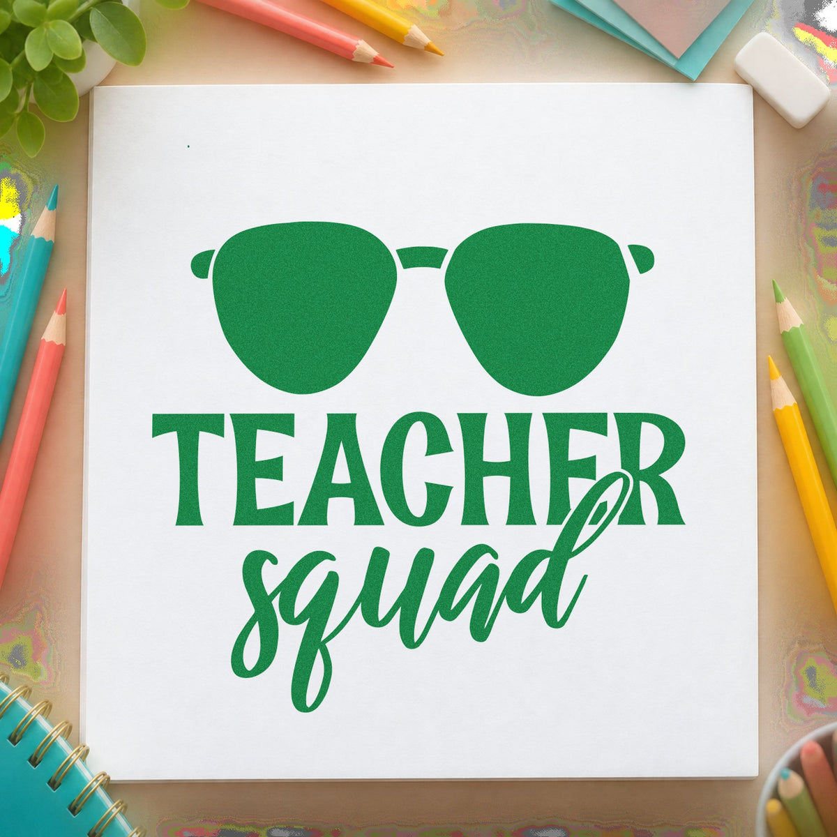 Teacher Squad Dark Sunglasses craft stamp imprint in green ink on a handmade project, one idea being itinerary pages.