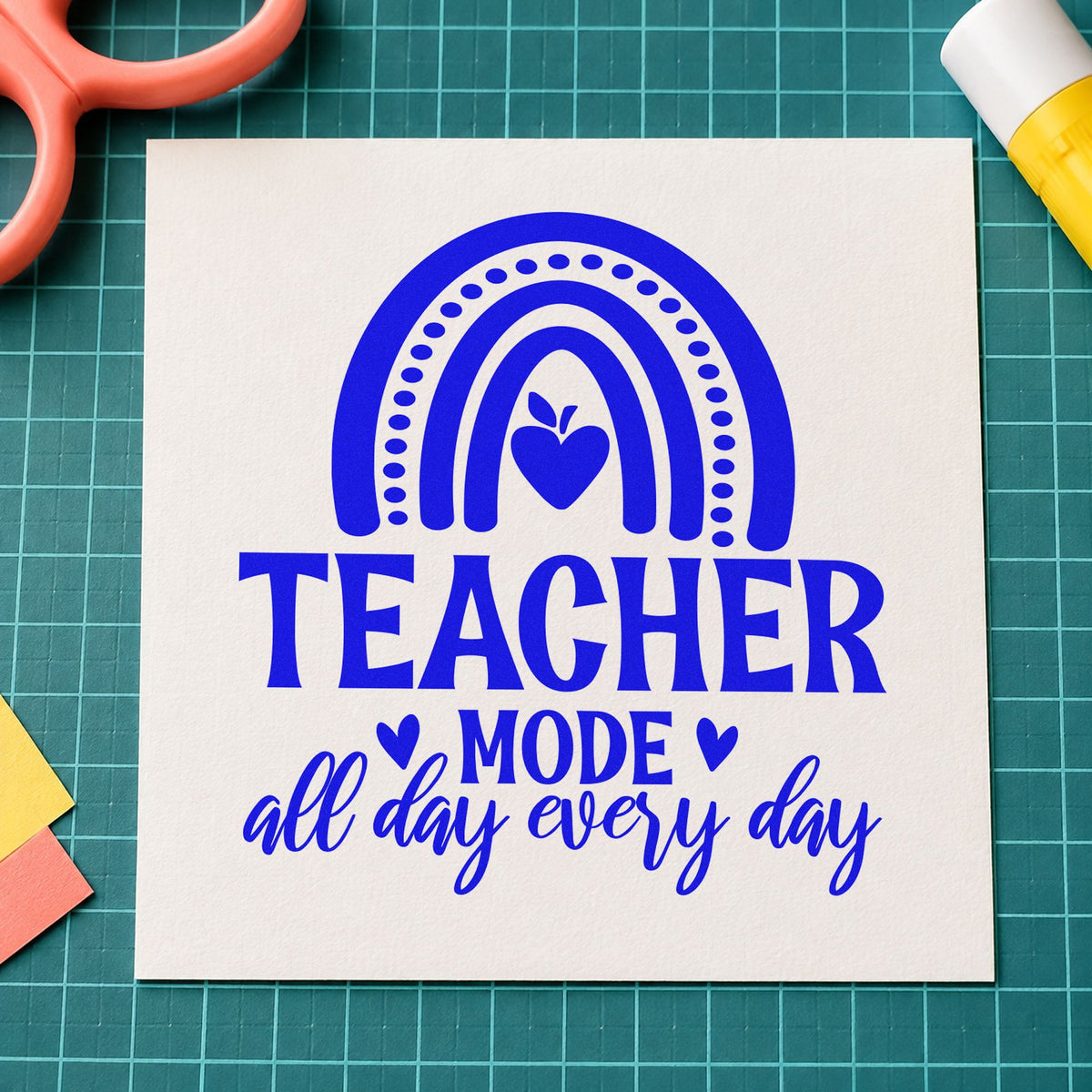 Teacher Mode Rainbow Apple craft stamp imprinted in blue ink on paper, a design suited to craft pack seals.