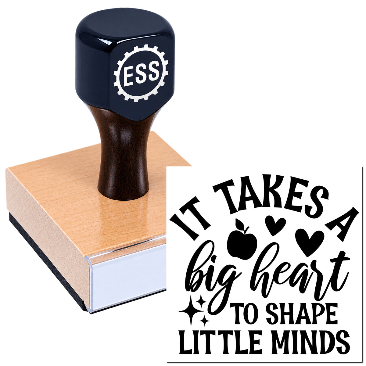Black wooden-handled rubber stamp and seal with "It takes a big heart to shape little minds" and apple-heart design.