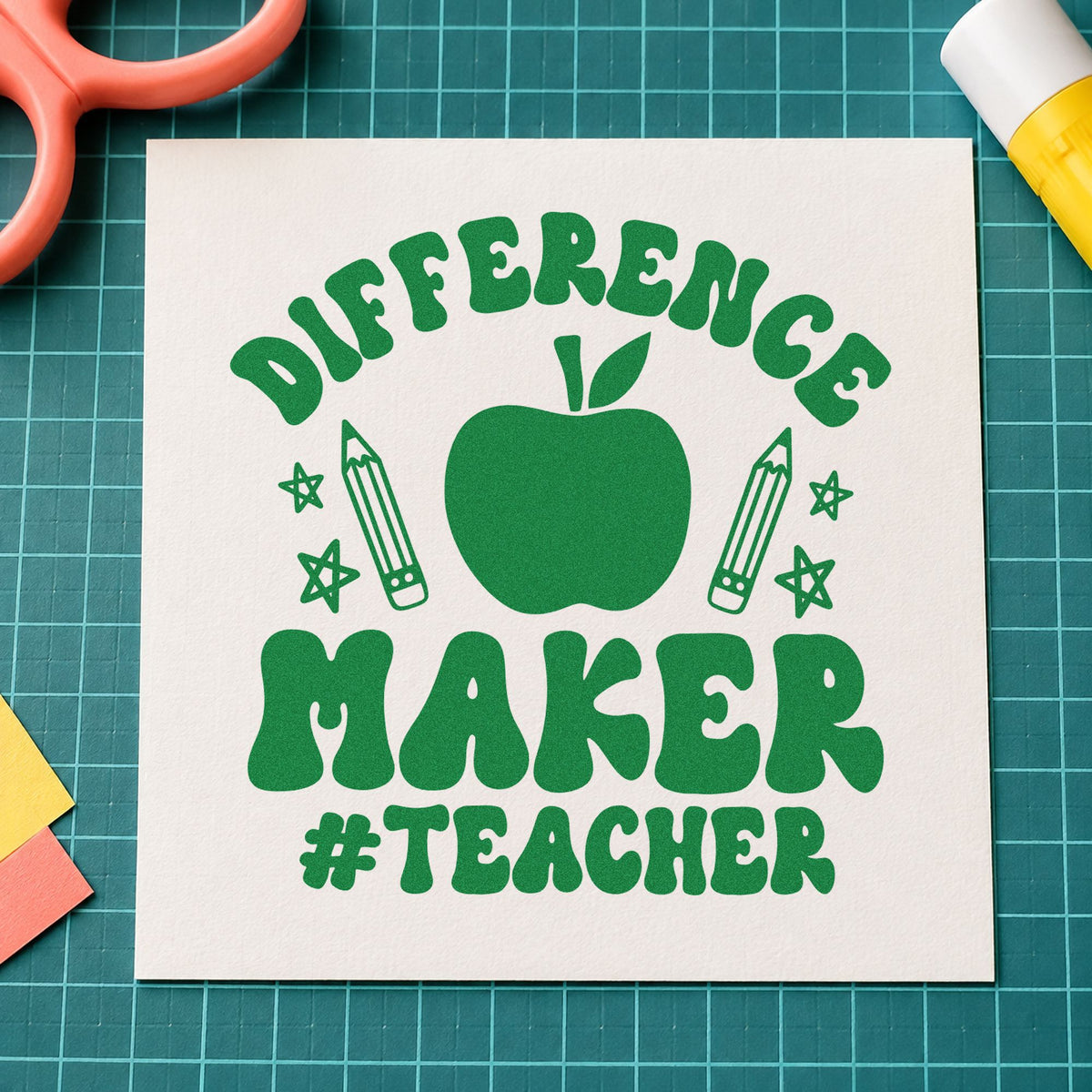 Difference Maker Teacher Apple craft stamp imprint in green ink on a handmade project, one idea being nomination pages.