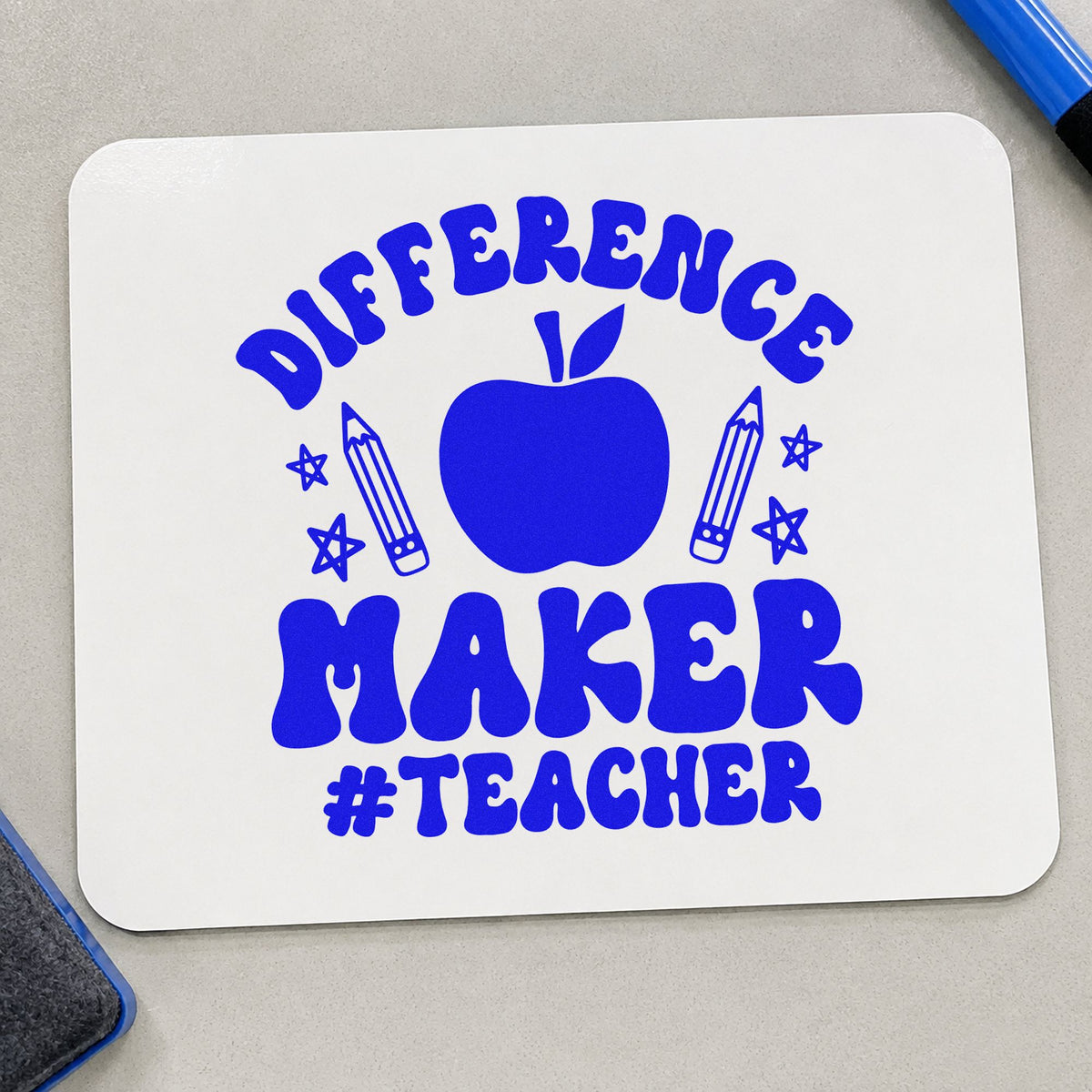 Difference Maker Teacher Apple craft stamp in blue ink on cardstock, an easy option for gilet chest panels.