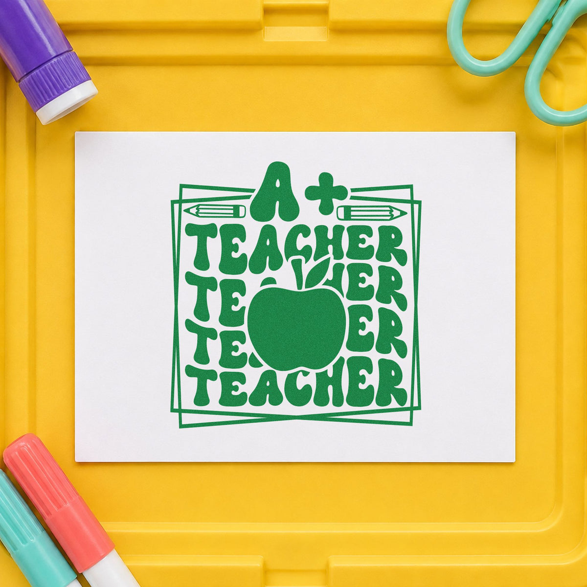 A Plus Teacher Repeated Frame craft stamp imprint in green ink on a handmade project, one idea being framed results board.