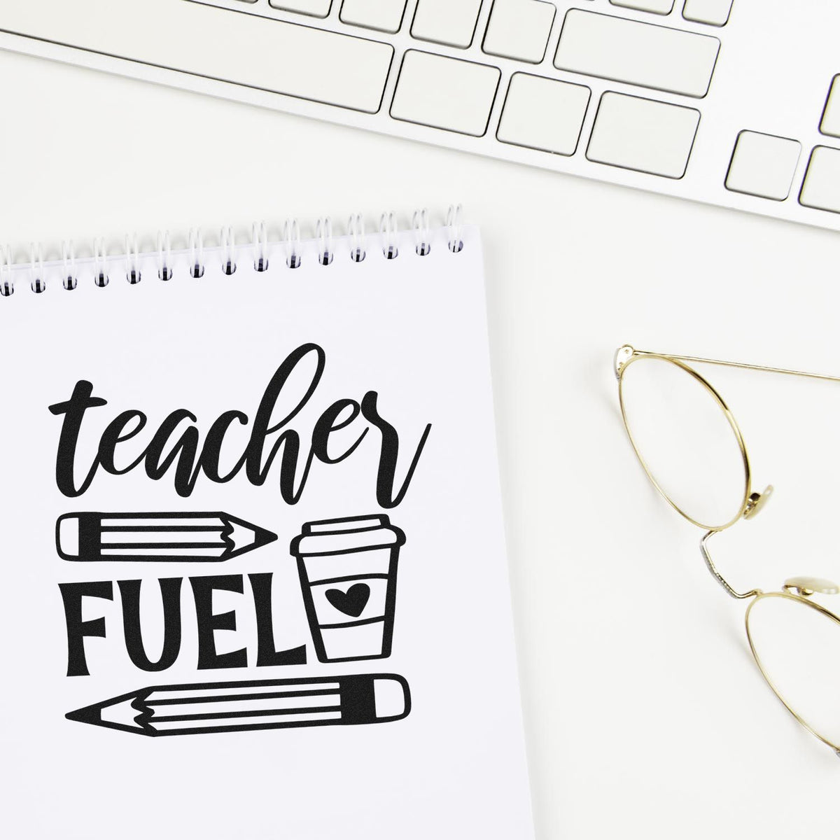 Teacher Fuel Coffee Pencils With Hearts Stamp - Premium Vintage Pro Wooden imprint stamped in black ink. "Teacher Fuel" appears with two pencils and a takeaway cup with a heart.