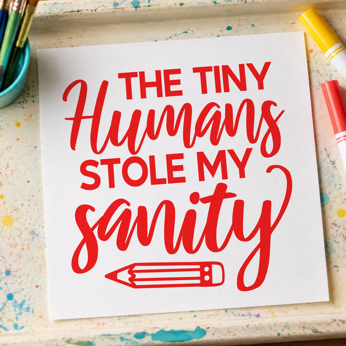 Tiny Humans Stole Sanity rubber stamp shown in red ink, stamped for projects such as themed day notes.