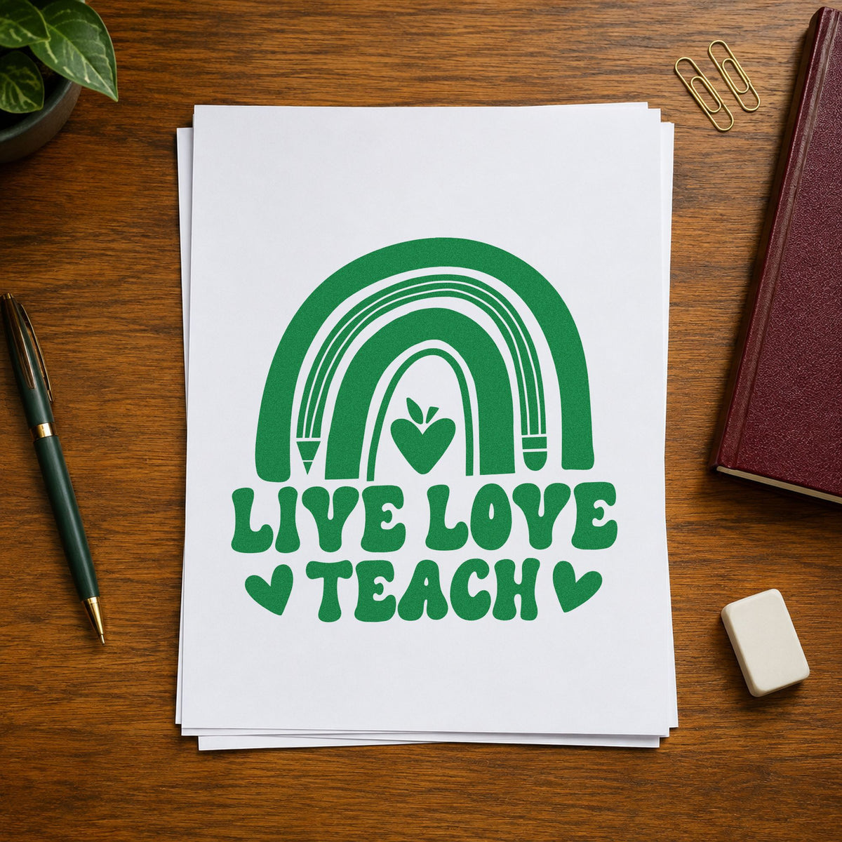 Live Love Teach Rainbow craft stamp imprint in green ink on a handmade project, one idea being framed studio arc.