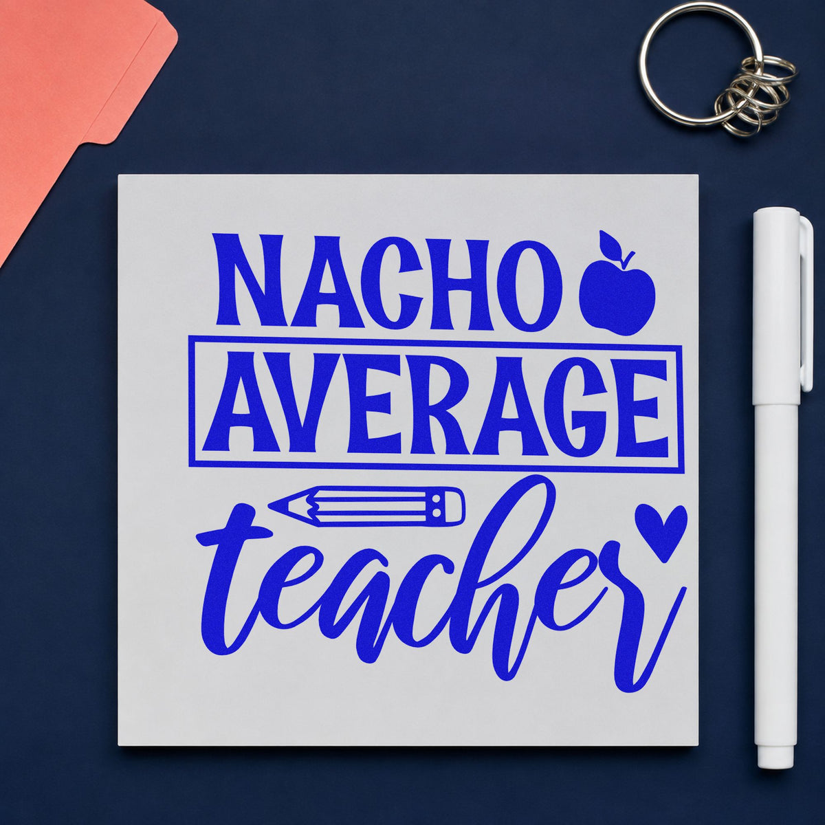 Nacho Average Teacher Apple craft stamp in blue ink on cardstock, an easy option for team bandana panels.