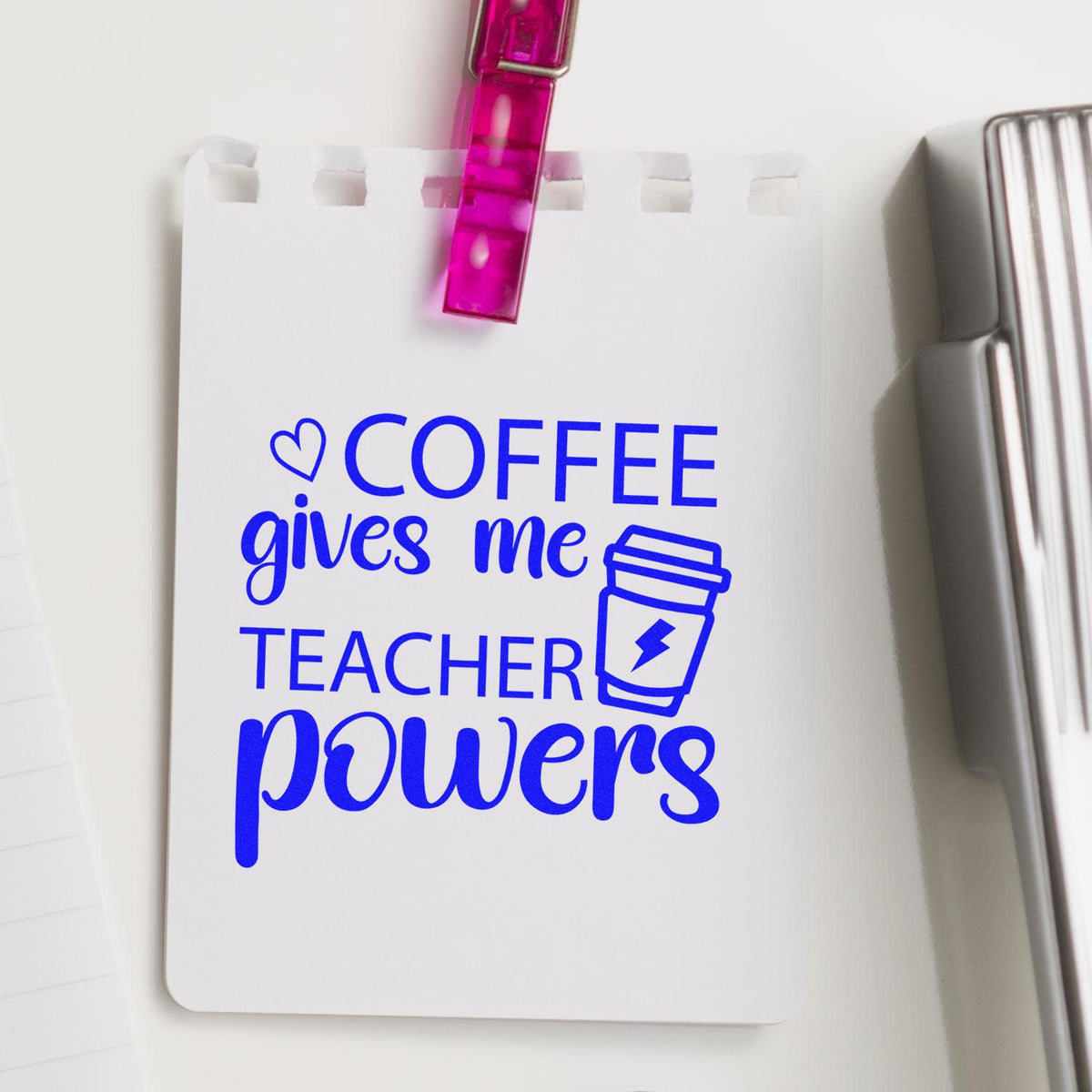 Blue Coffee gives me teacher powers stamp/seal design on white card, clipped with a pink clip and coffee cup icon.