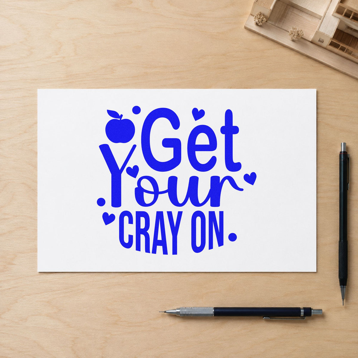 Get Your Cray On craft stamp in blue ink on cardstock, an easy option for smock front panels.