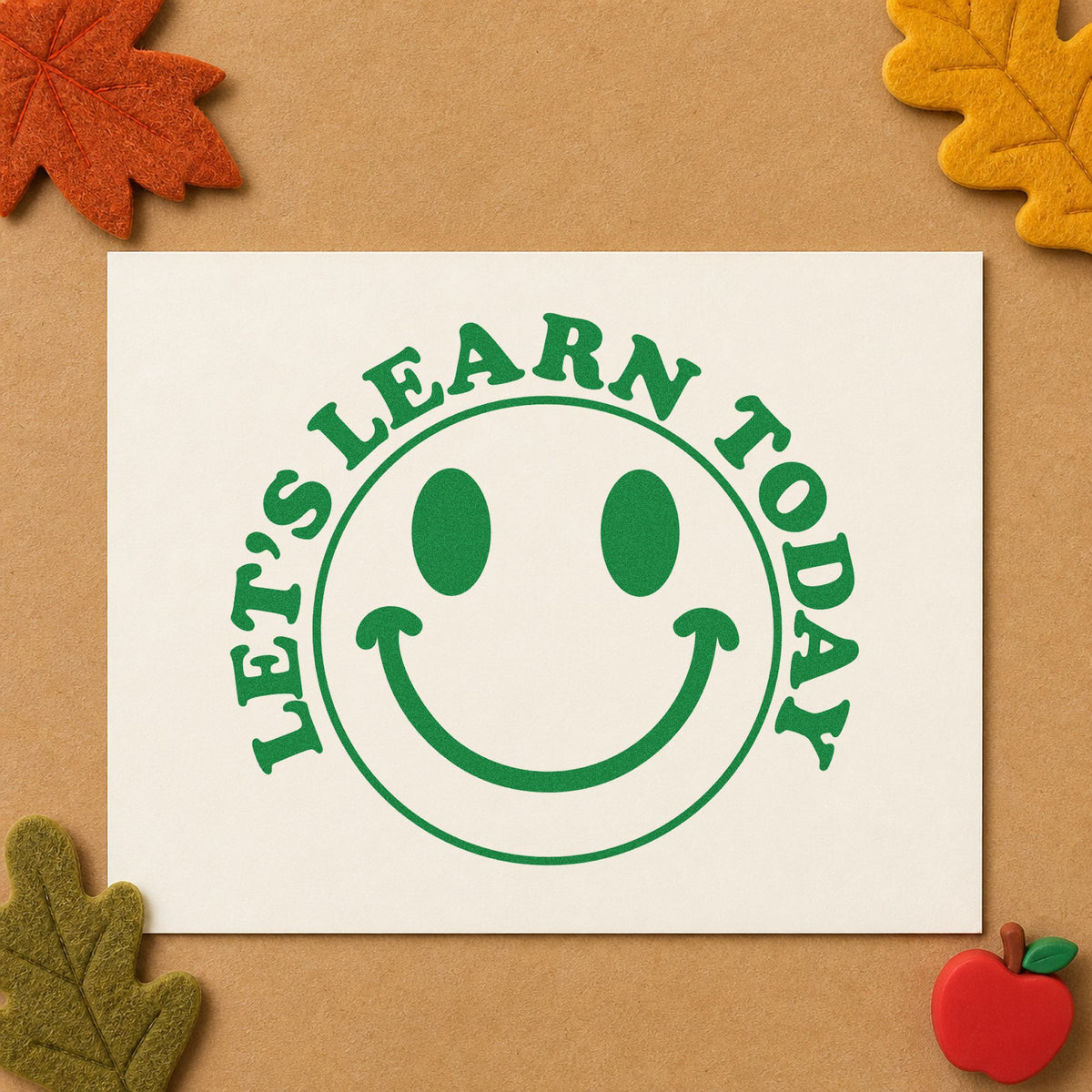 Let's Learn Today Smile craft stamp imprint in green ink on a handmade project, one idea being register sheet pages.