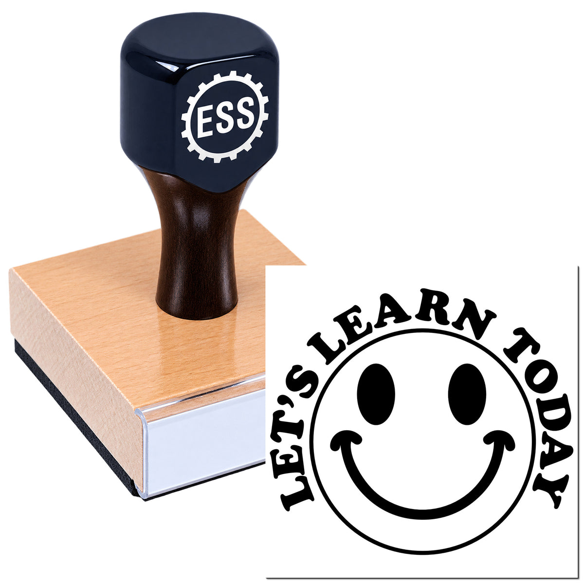 Navy stamp and seal on pink wooden block, with smiley face and black "Learn Today" design.
