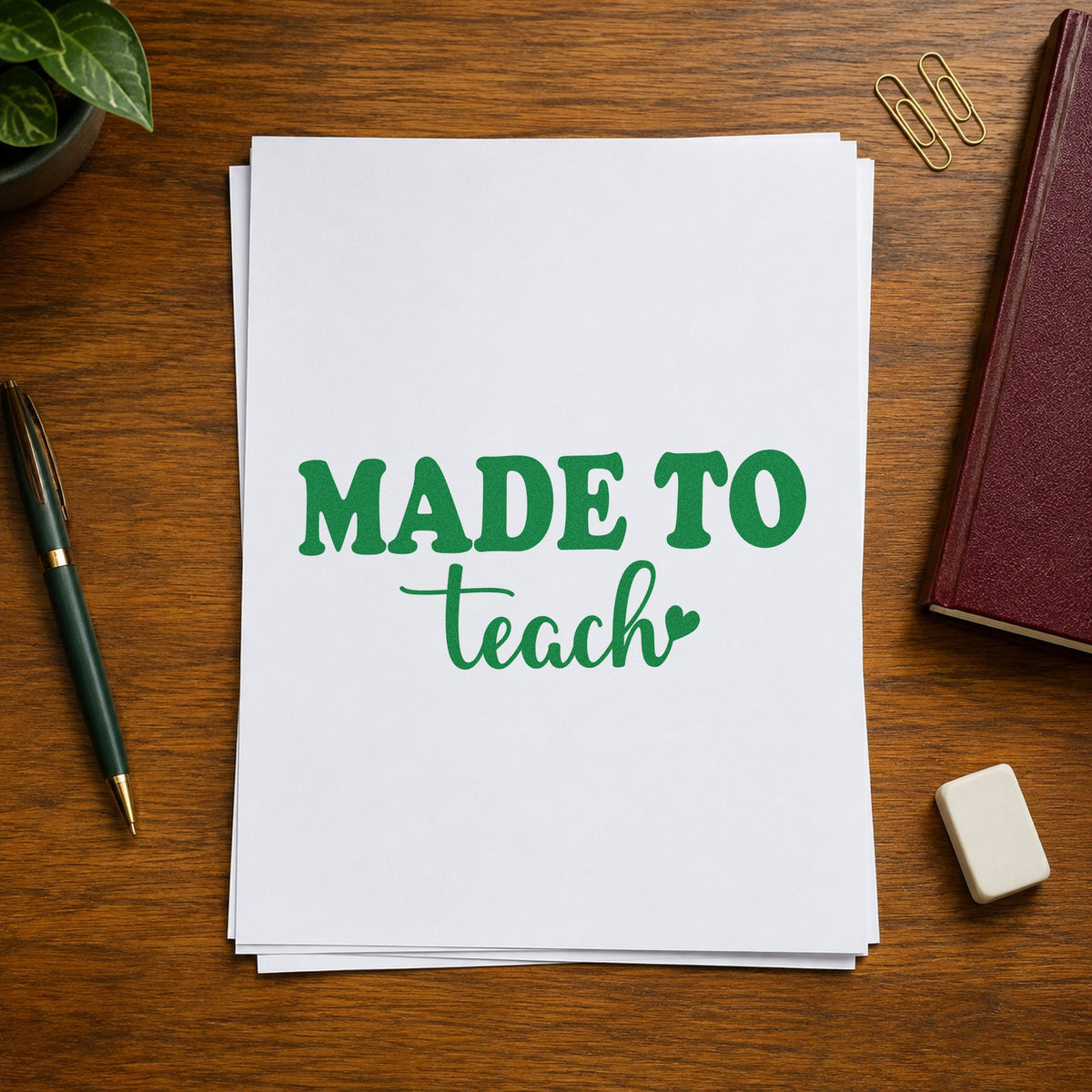 Made To Teach Heart craft stamp imprint in green ink on a handmade project, one idea being discernment pages.