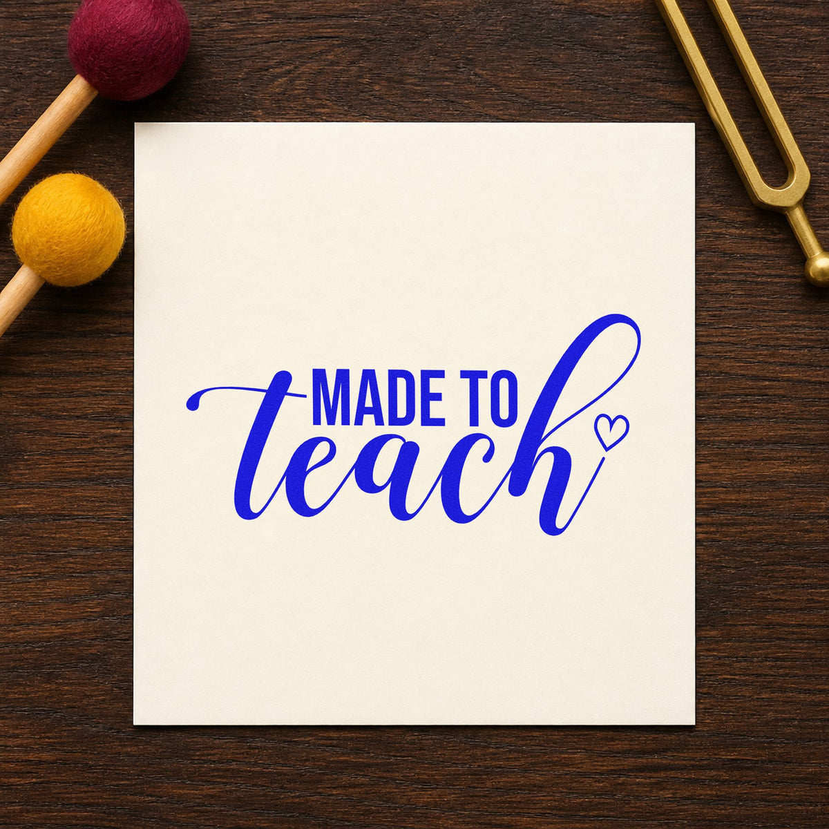 Made To Teach Outline Heart craft stamp in blue ink on cardstock, an easy option for apron bib panels.