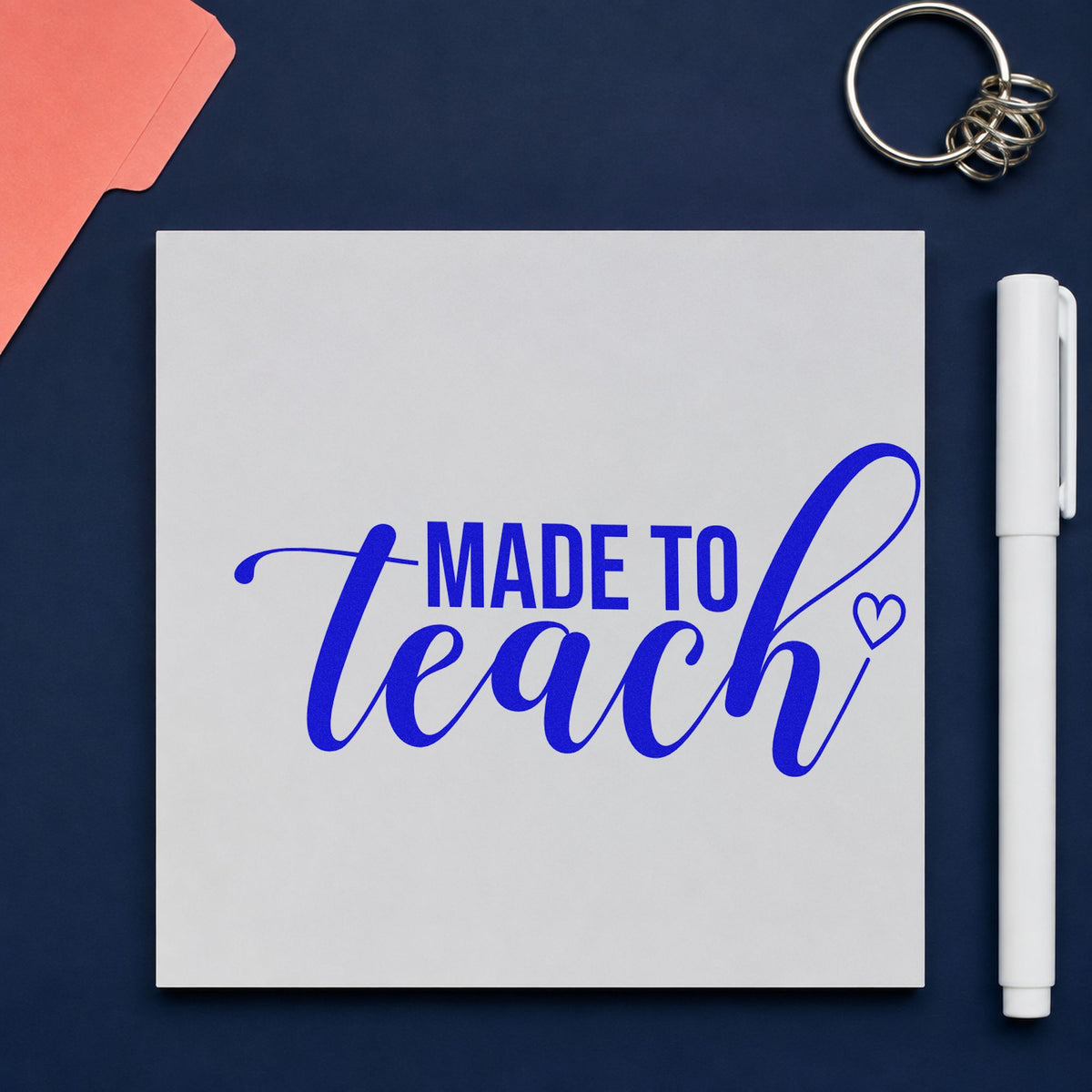 Made To Teach Outline Heart craft stamp imprinted in blue ink on paper, a design suited to card blank seals.