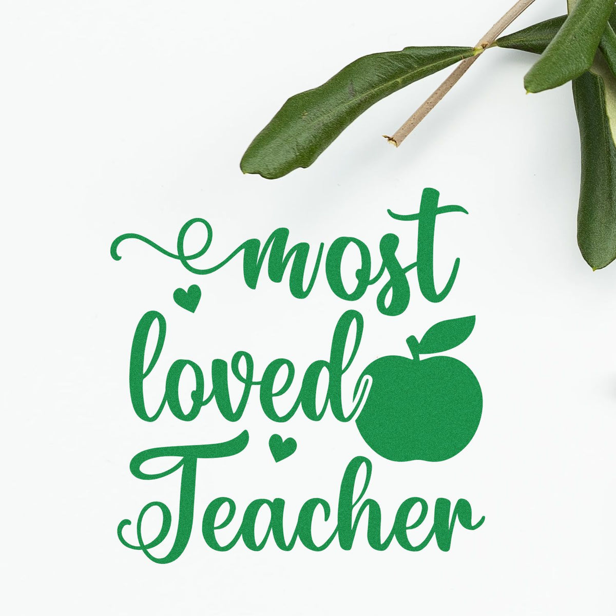 Green most loved Teacher stamp seal with apple and hearts on a white background, accented by leaves.