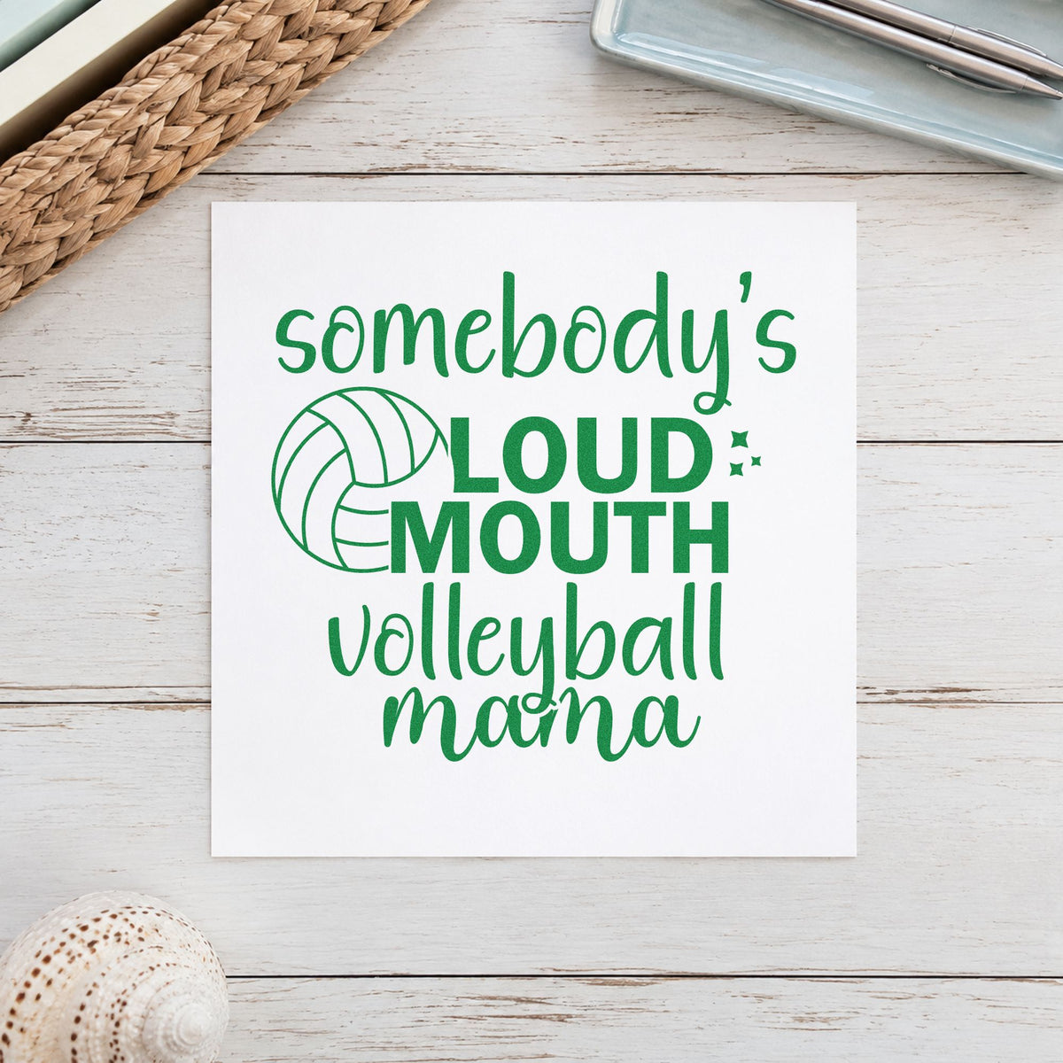 Loud Mouth Volleyball Mama craft stamp imprint in green ink on a handmade project, one idea being chant sheet pages.