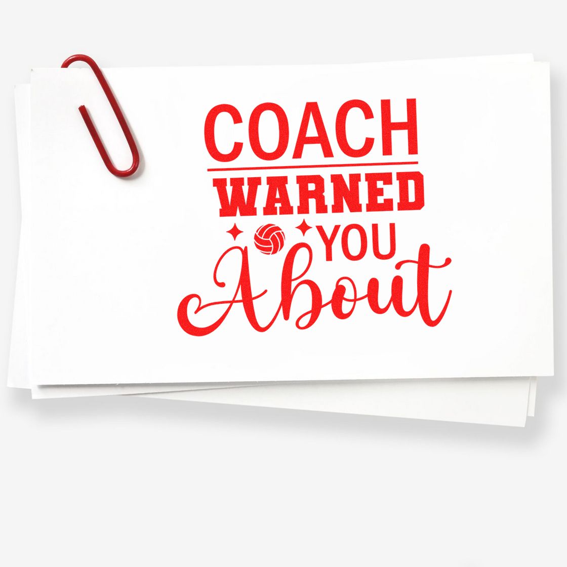 Red custom stamp and seal design on white paper with red paperclip, reading COACH WARNED YOU About in bold script.