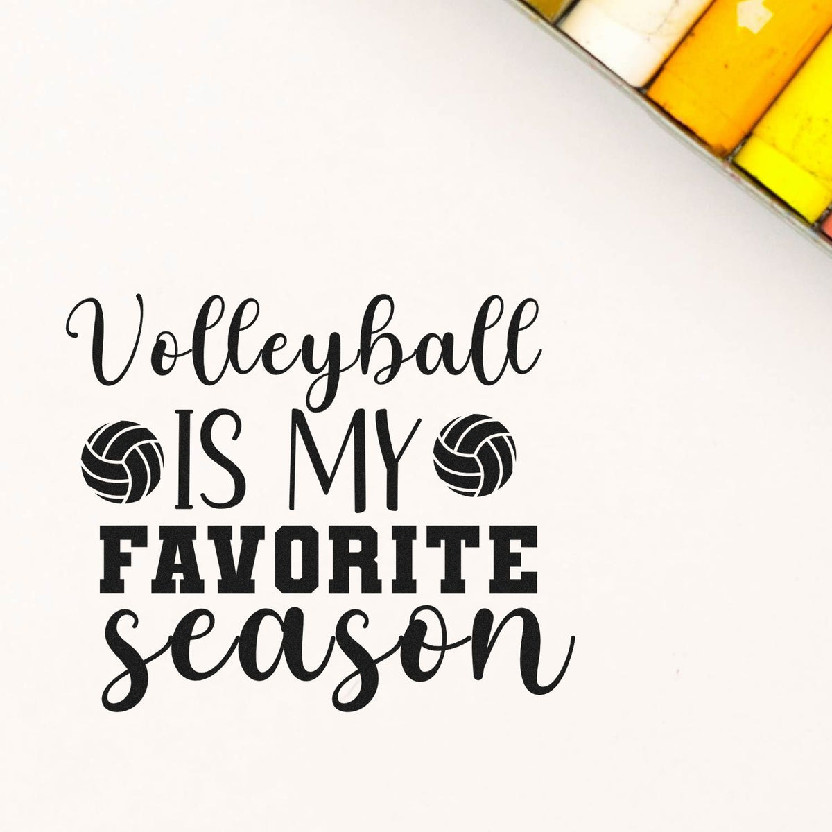 Black volleyball stamp and seal design reading Volleyball is my favorite season on white with yellow swatches.