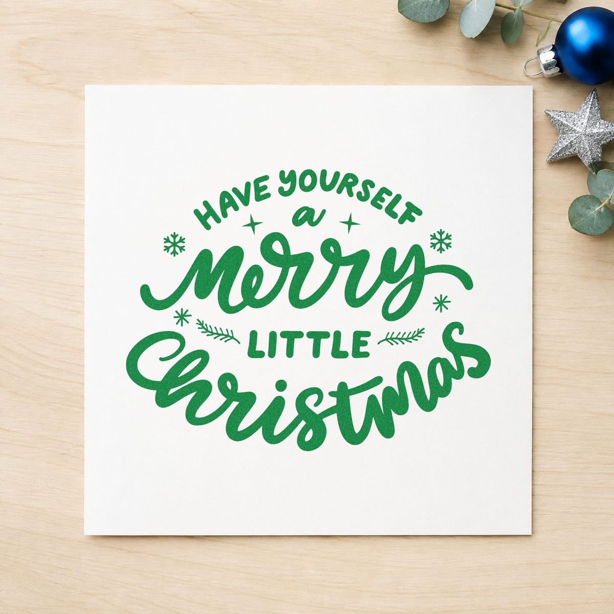 Have Yourself Merry Little Christmas craft stamp imprint in green ink on a handmade project, one idea being framed fireside wall.