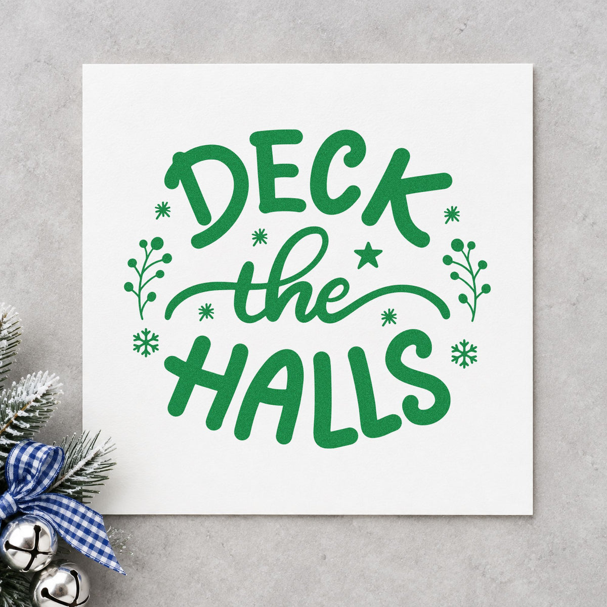 Deck The Halls Sprigs craft stamp imprint in green ink on a handmade project, one idea being framed stair swag.