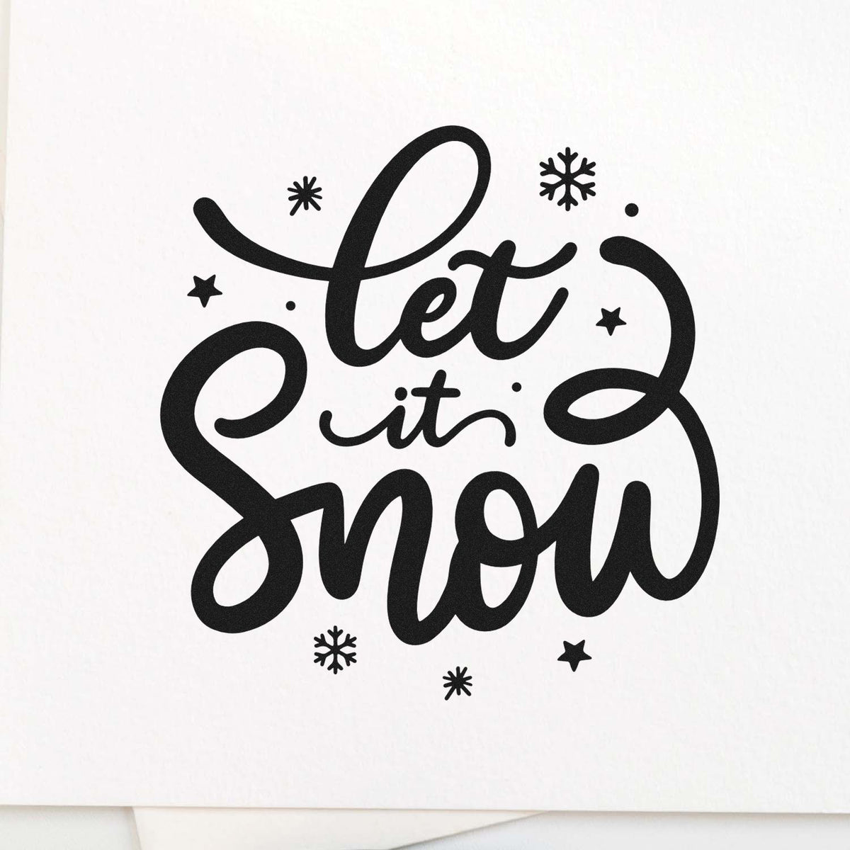 Black let it snow stamp and seal design with snowflakes and stars on a white background.