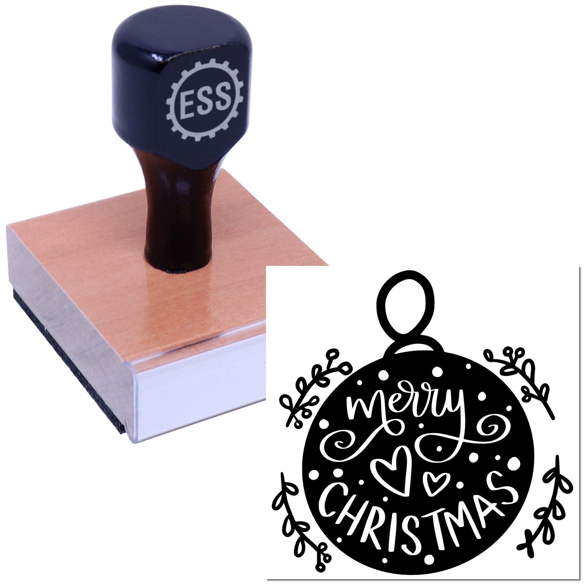 Black ESS rubber stamp on pink block, with white Merry Christmas ornament seal design.