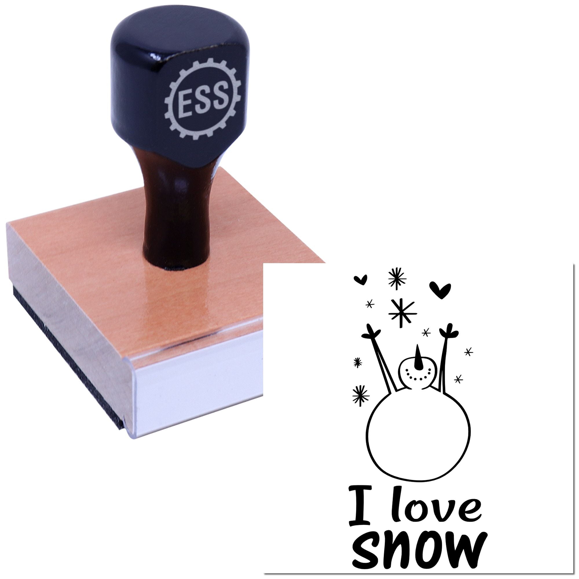 Black ESS rubber stamp on a pink wood block, with a black I love snow snowman seal design on white.
