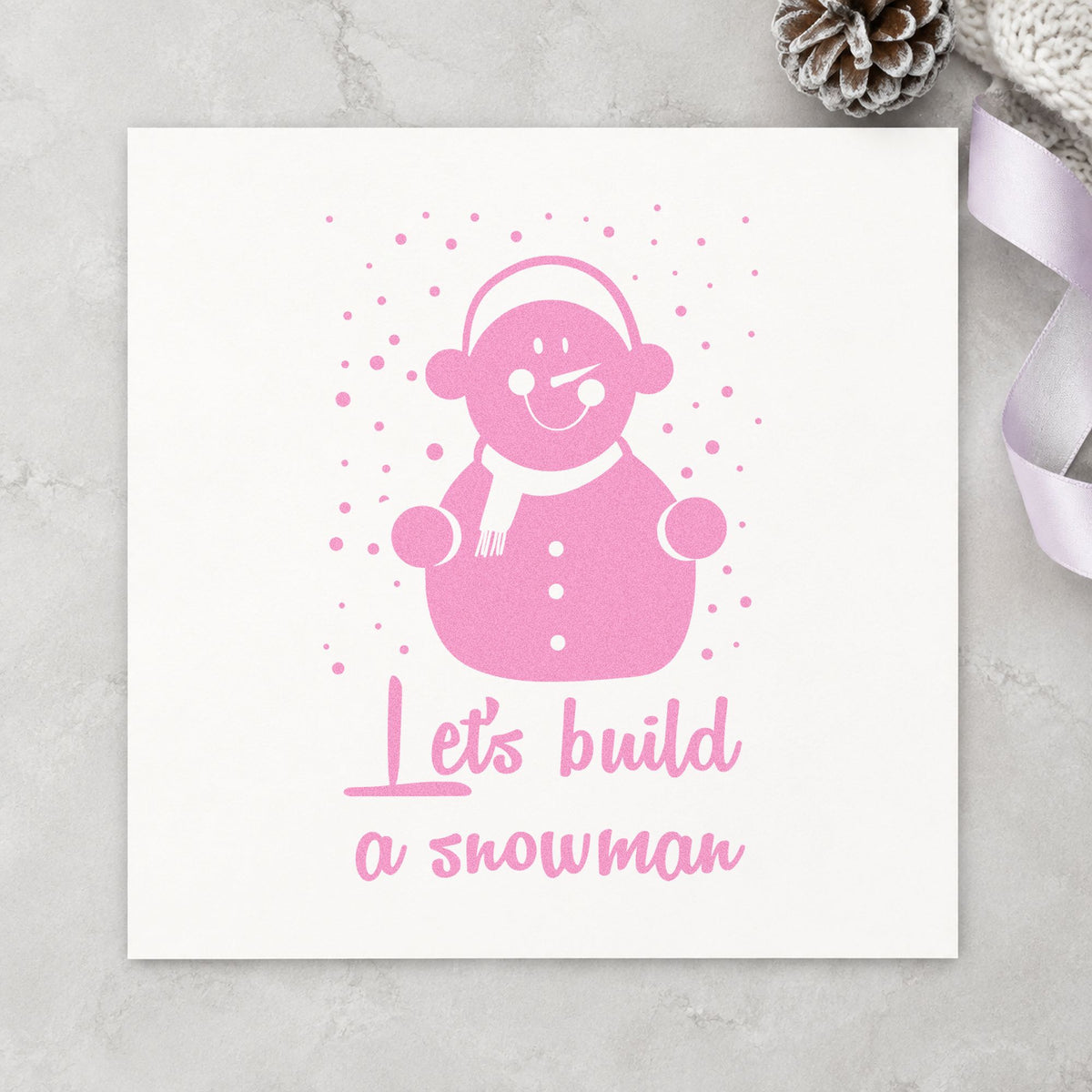 Let's Build A Snowman craft stamp in purple ink on cardstock, an easy option for build kit tags.