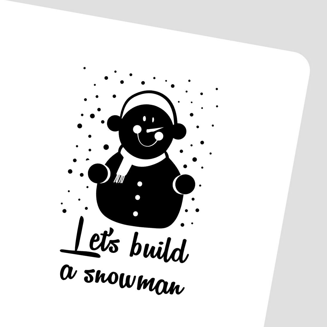 Black snowman stamp and seal with scarf, headphones, and Lets build a snowman text on white background.