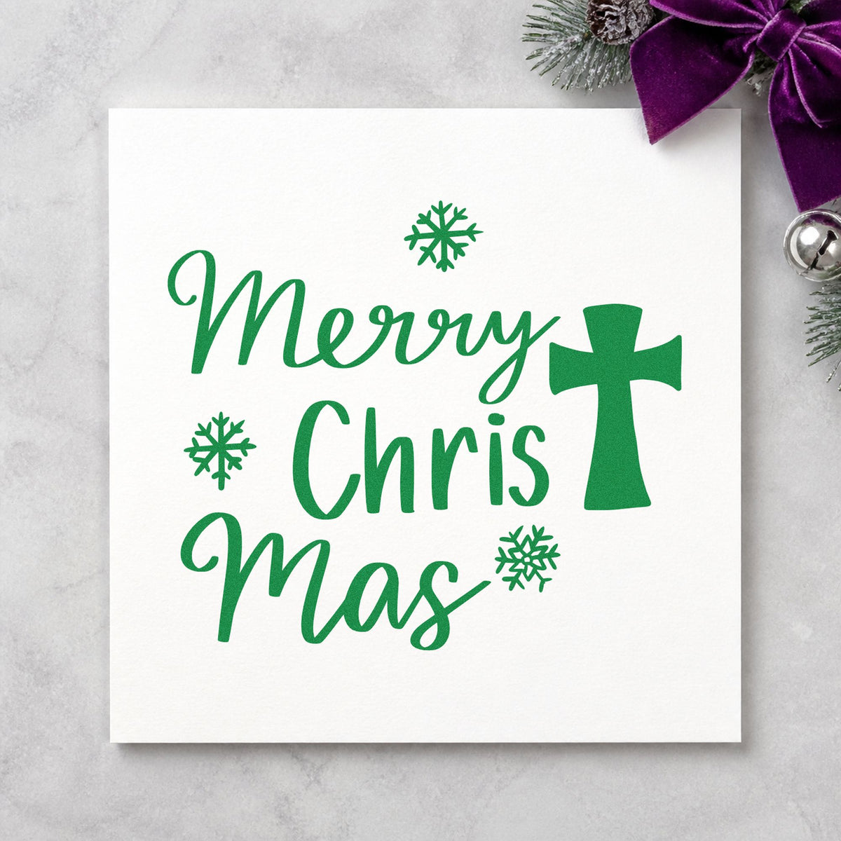 Merry Christmas Cross craft stamp imprint in green ink on a handmade project, one idea being poinsettia gift tags.