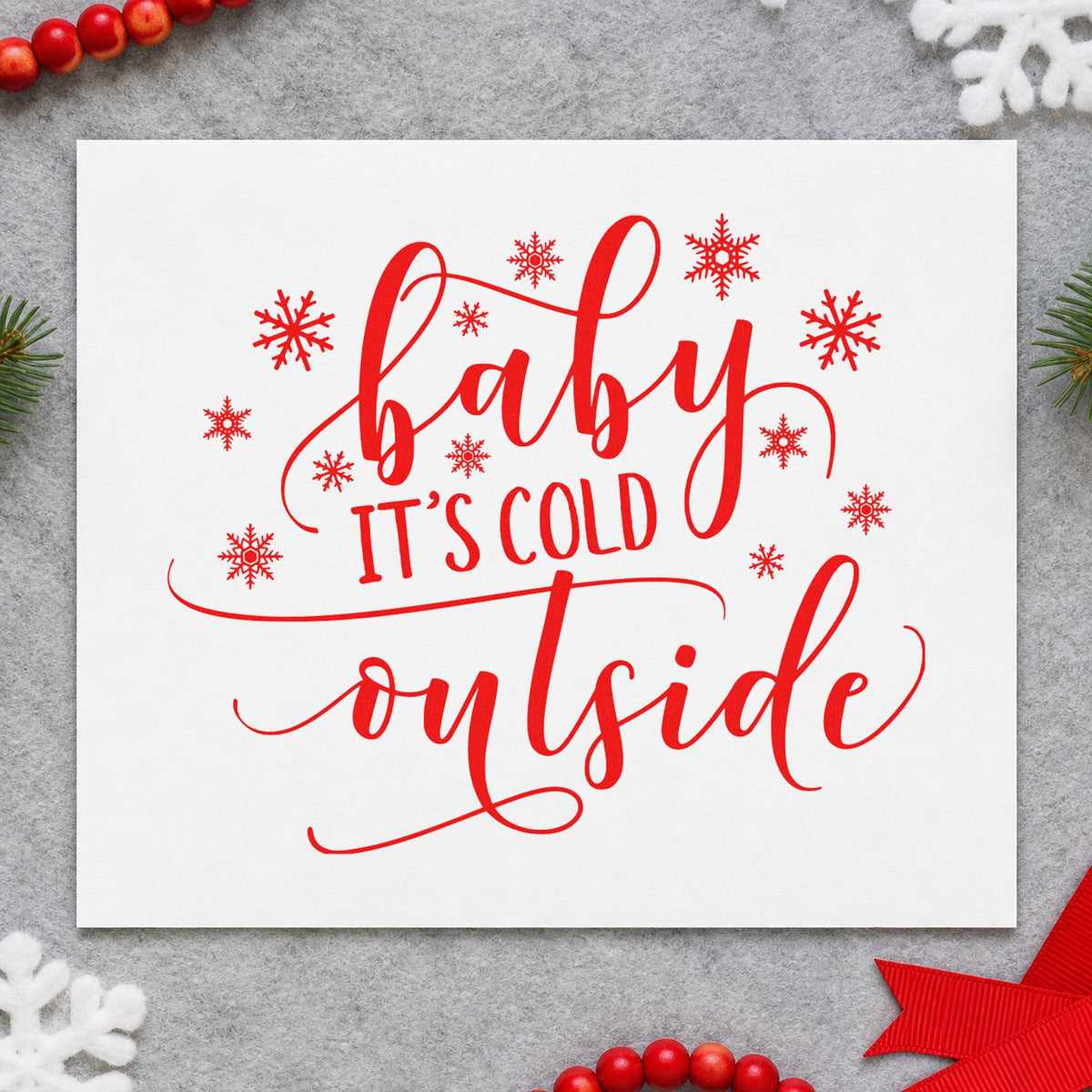 Baby It's Cold Outside craft stamp in red ink on cardstock, an easy option for blanket gift wrap.