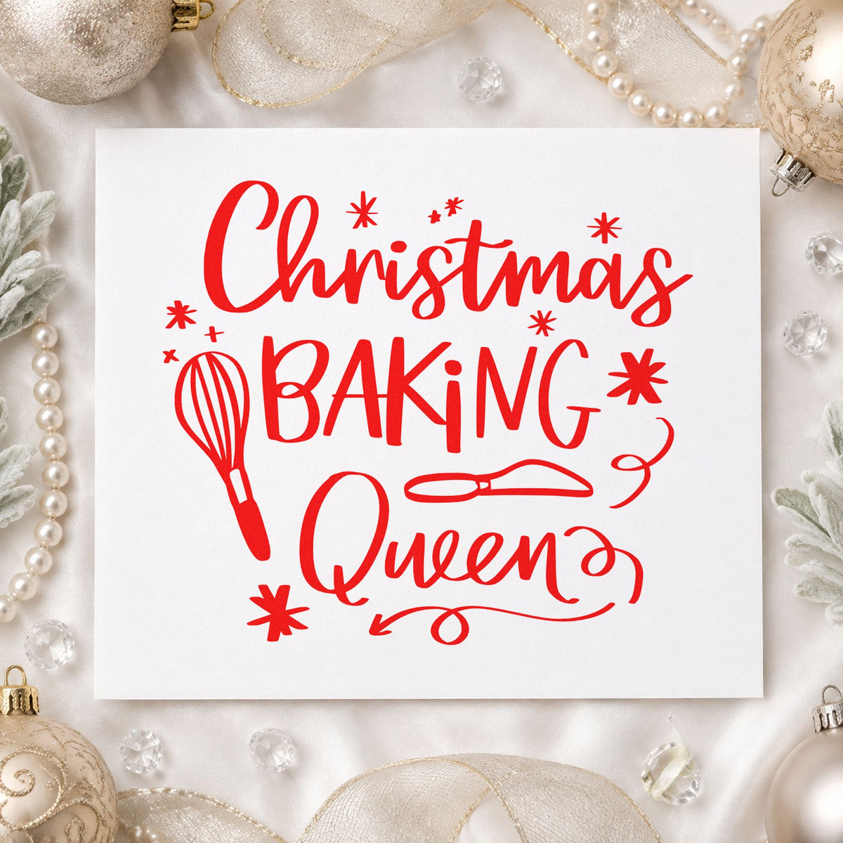 Christmas Baking Queen craft stamp in red ink on cardstock, an easy option for tea towel printing.