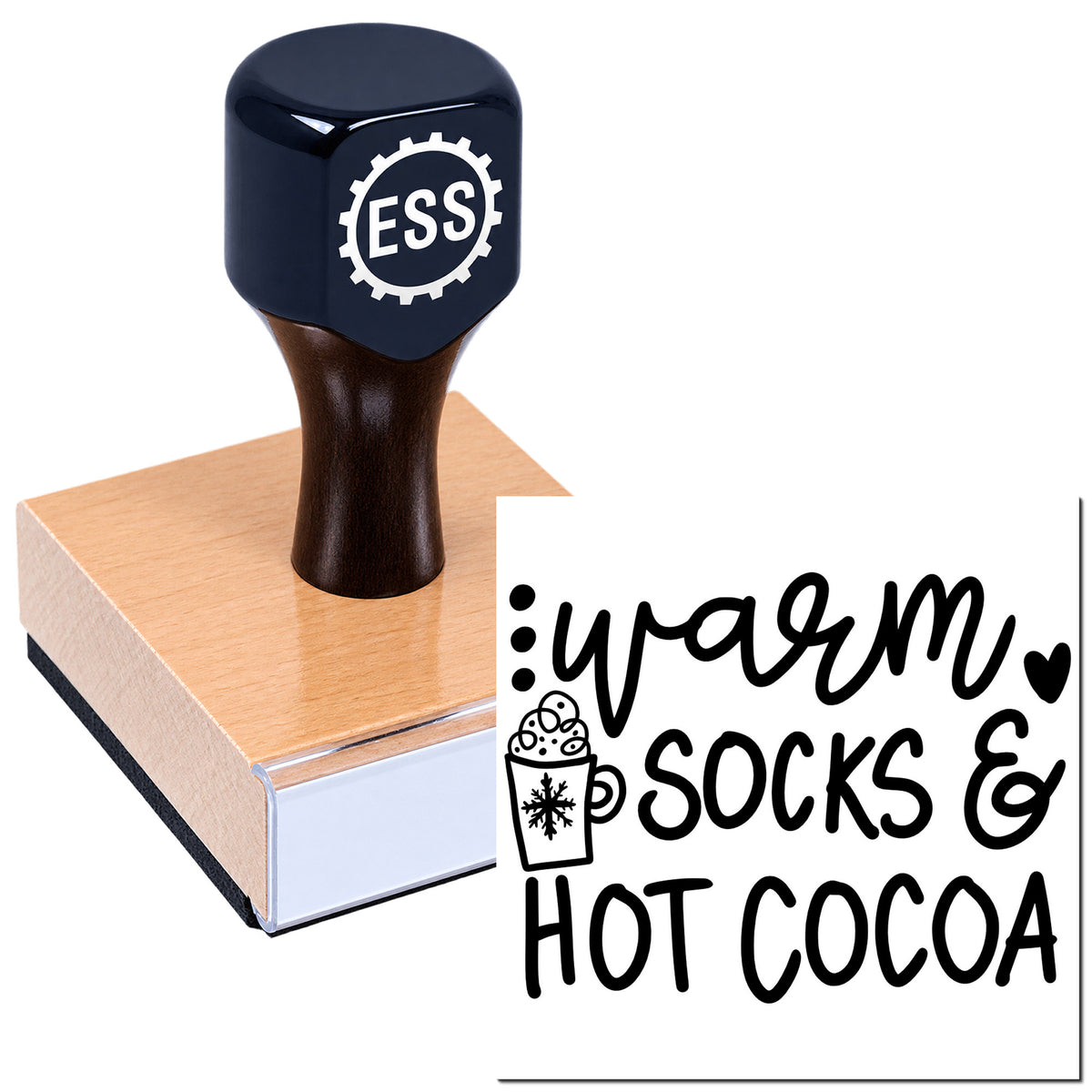 Dark blue ESS rubber stamp and seal with tan wooden base, showing black "warm socks & hot cocoa" design.