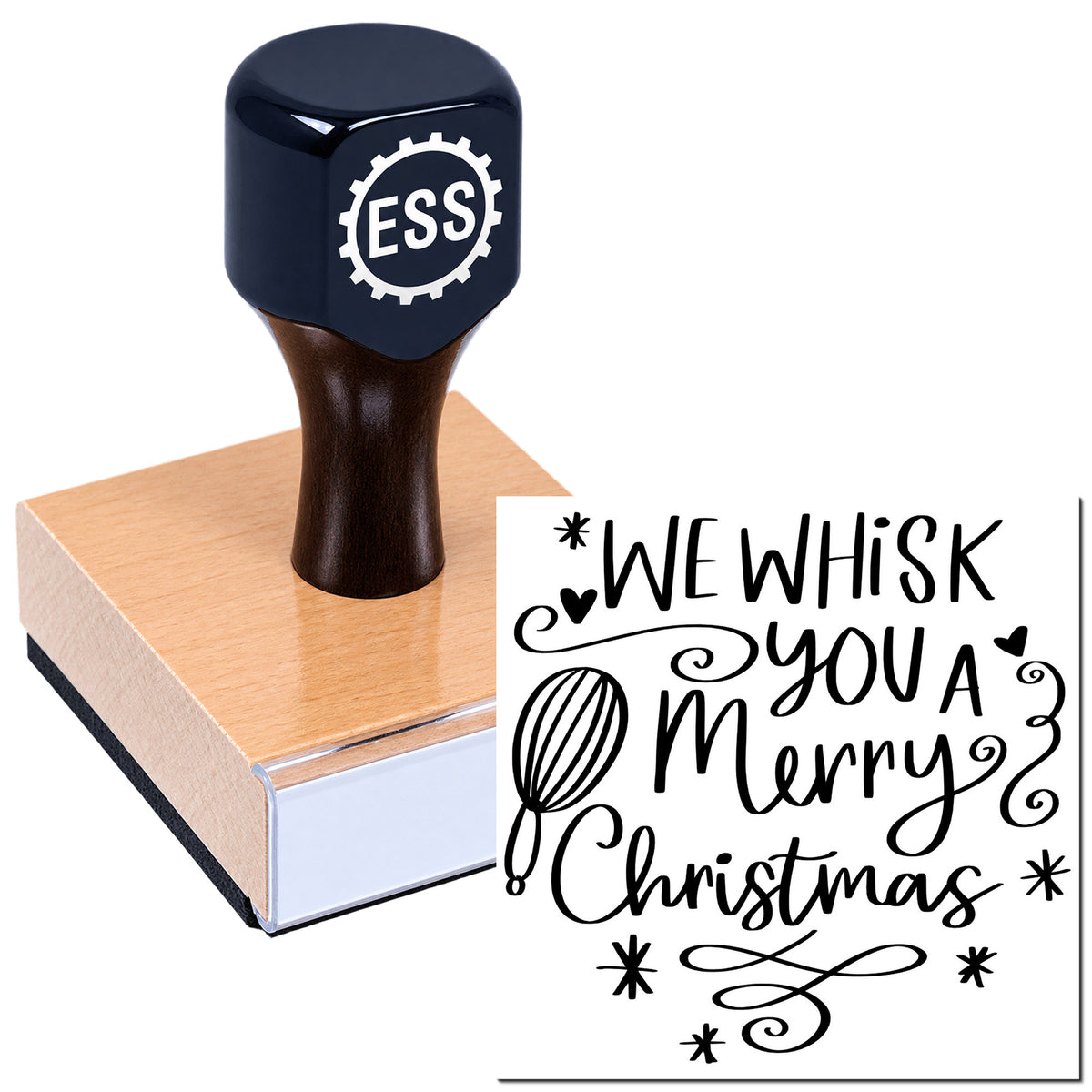 Dark blue ESS rubber stamp on pink wooden block, with black script seal reading "We Whisk You a Merry Christmas"