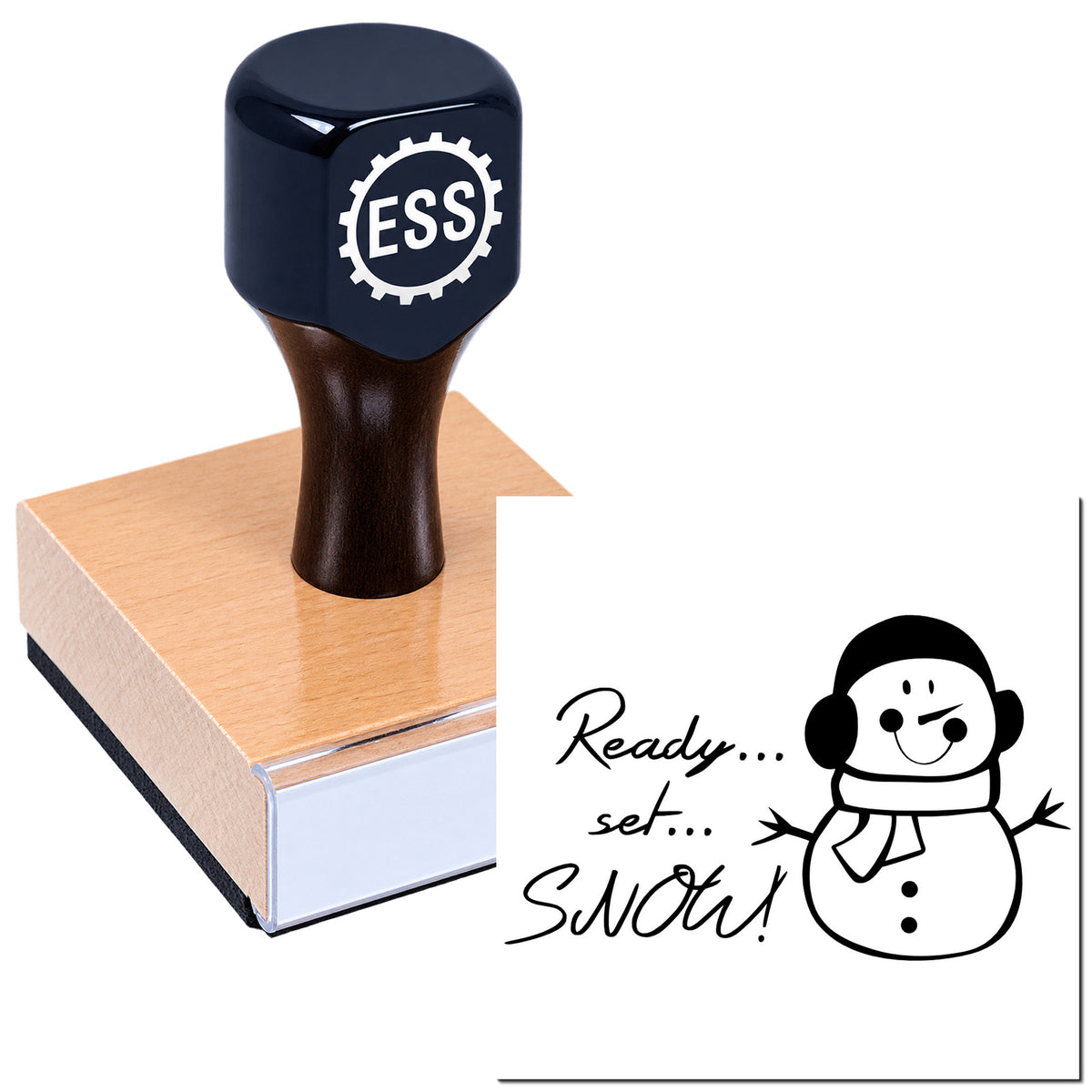 Dark blue ESS stamp and seal on a wooden base, beside a "Ready set SNOW!" snowman graphic.