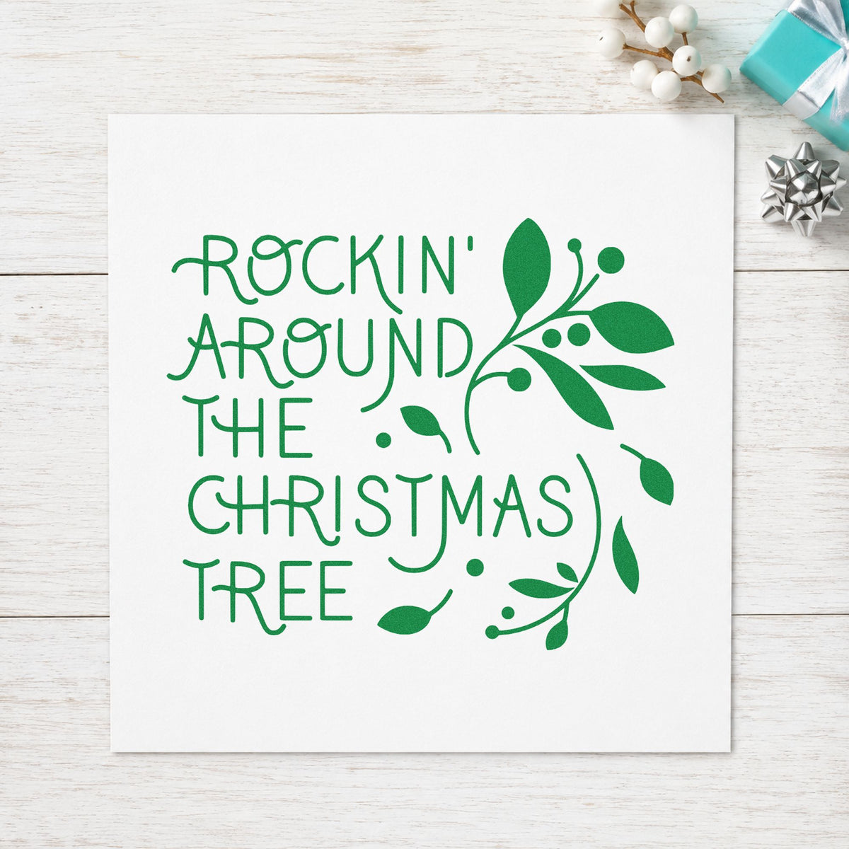 Rockin Around Christmas Tree craft stamp imprint in green ink on a handmade project, one idea being open mic sign sheet.