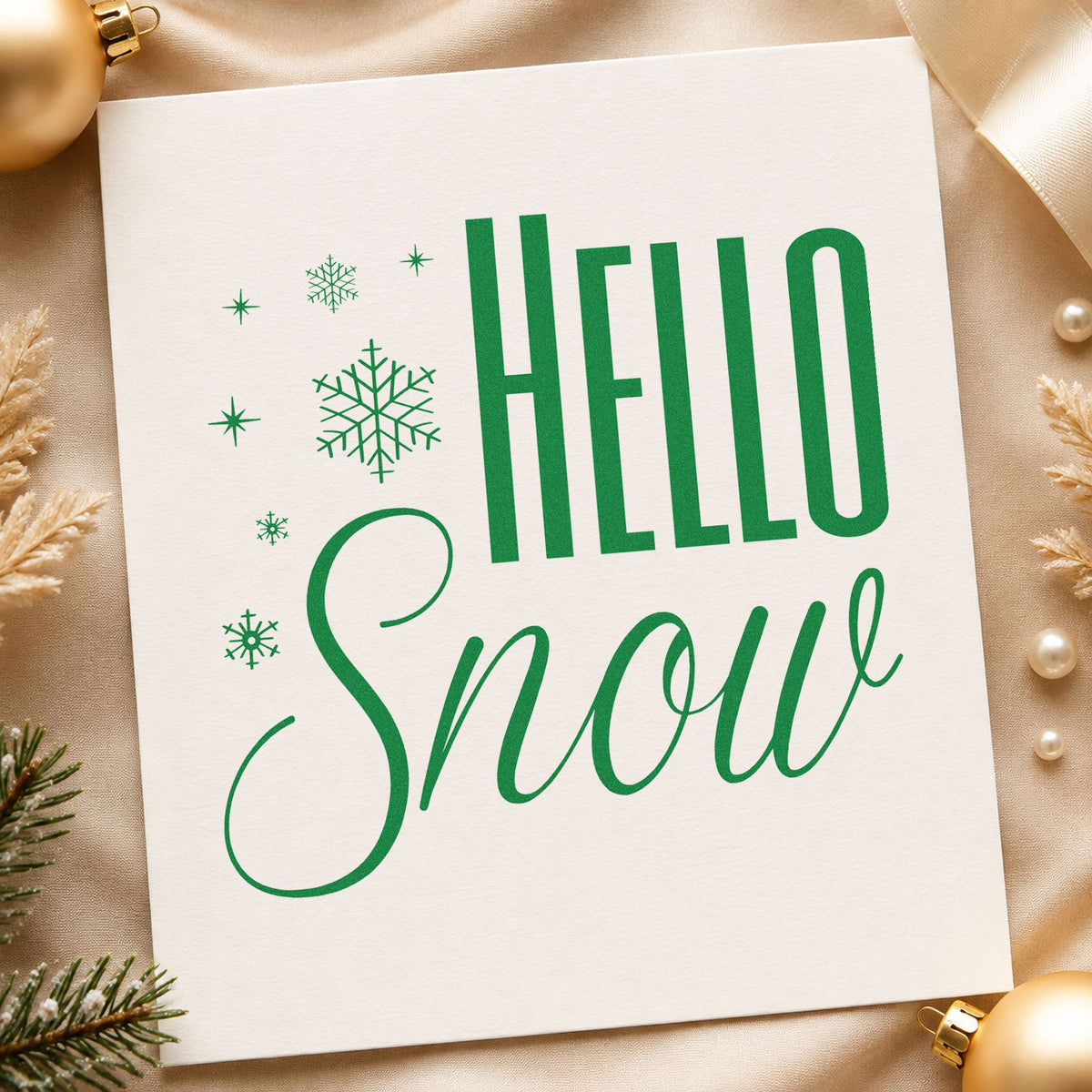 Hello Snow Snowflakes craft stamp imprint in green ink on a handmade project, one idea being neutral gift tags.