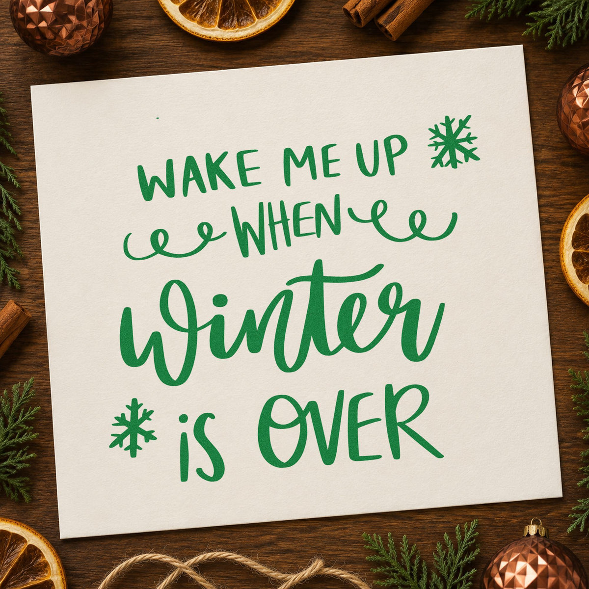 Wake Me When Winter Over craft stamp imprint in green ink on a handmade project, one idea being spa night invites.