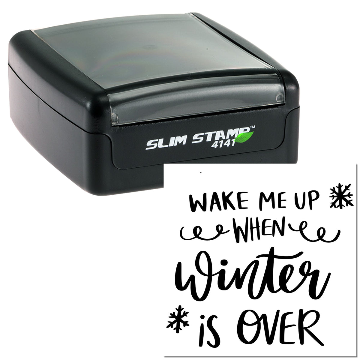 Black self-inking stamp and seal with clear top, printed with Wake Me Up When Winter Is Over and snowflake icons.
