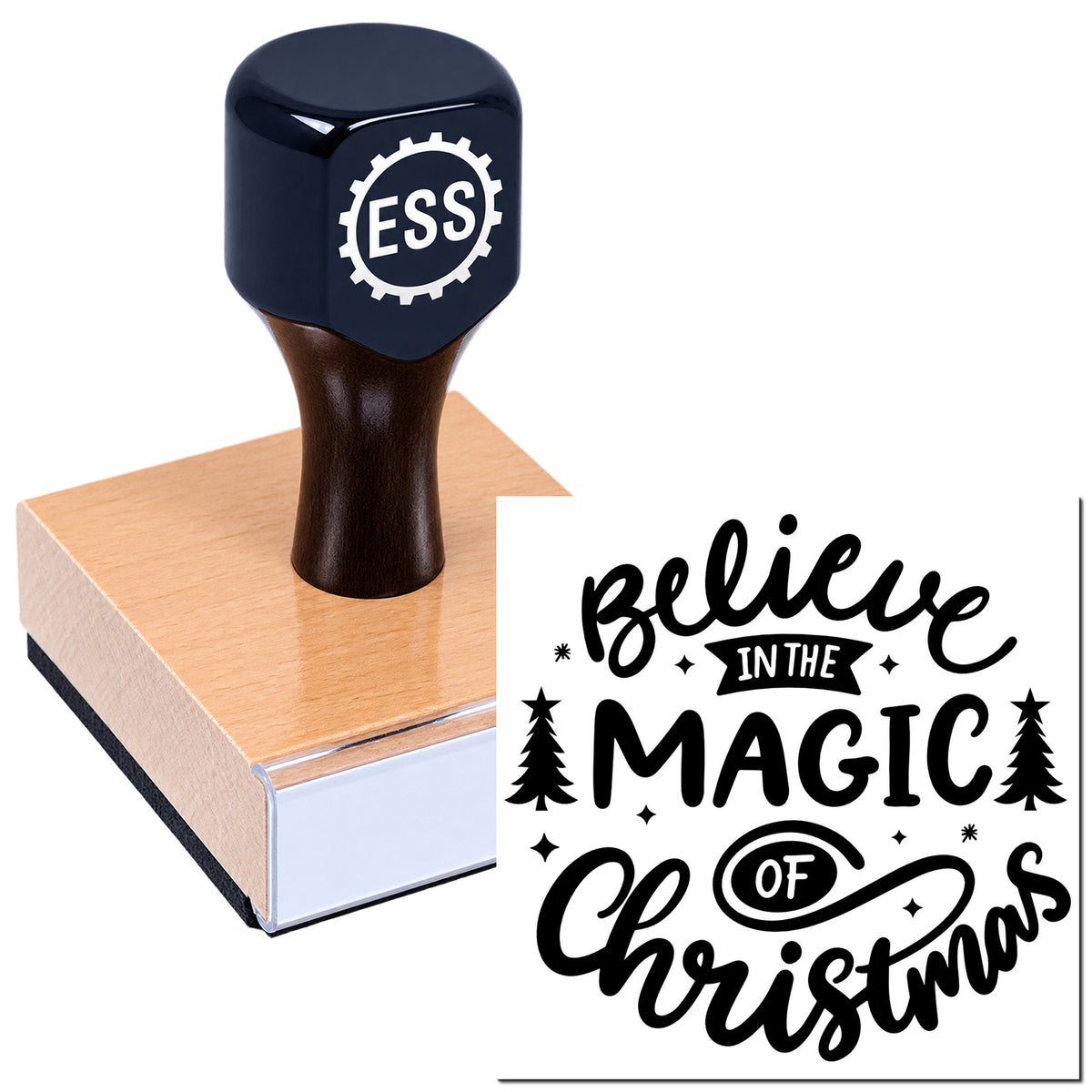 Dark blue ESS rubber stamp on a wood block, showing a black "Believe in the Magic of Christmas" seal design.