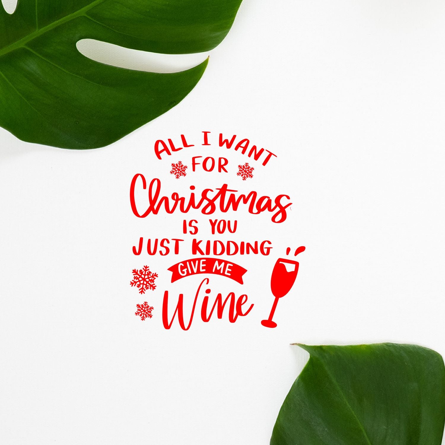 Red Christmas stamp seal design with wine glass, snowflakes and holiday quote on white, framed by green leaves.