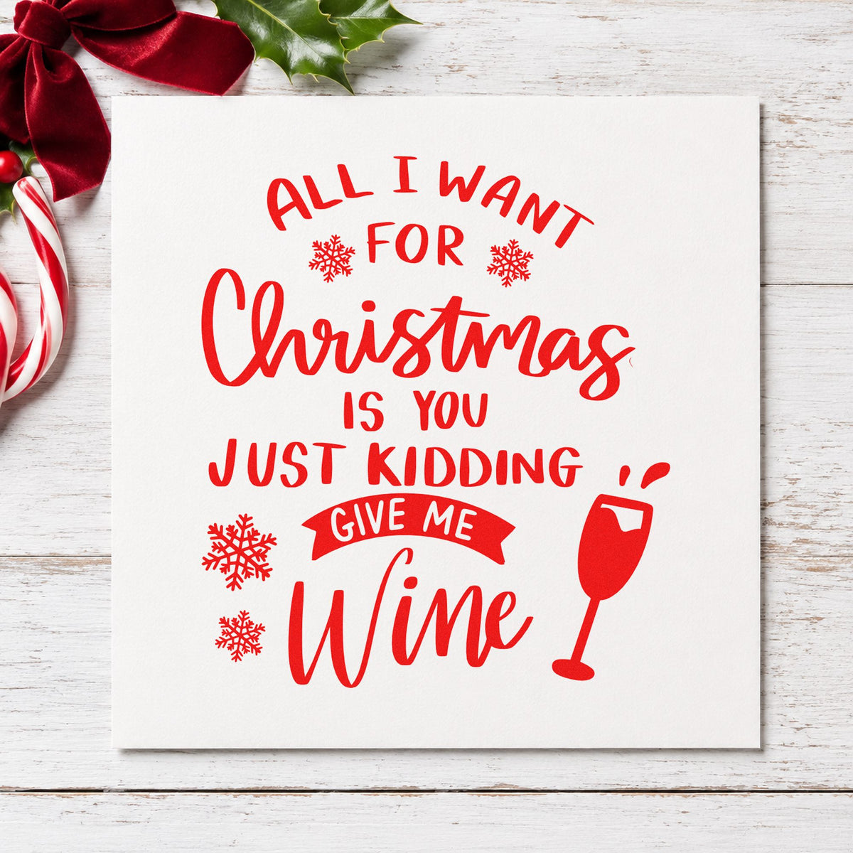 Christmas Just Give Wine rubber stamp shown in red ink, stamped for projects such as decanter box labels.